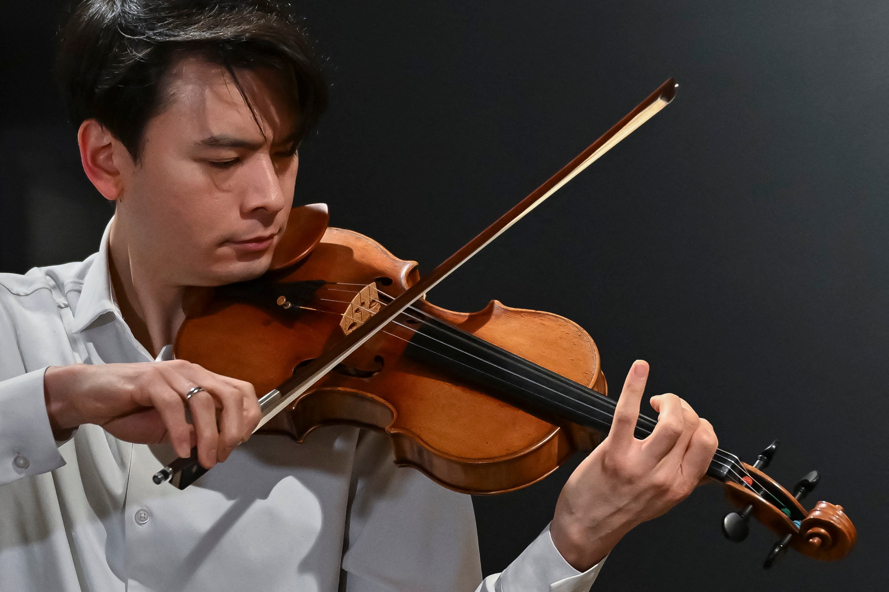 Classical US violinist Stefan Jackiw plays the Joachim-Ma Stradivarius violin during a preview of the instrument’s auction at Sotheby’s in New York on Monday. Photo: AFP