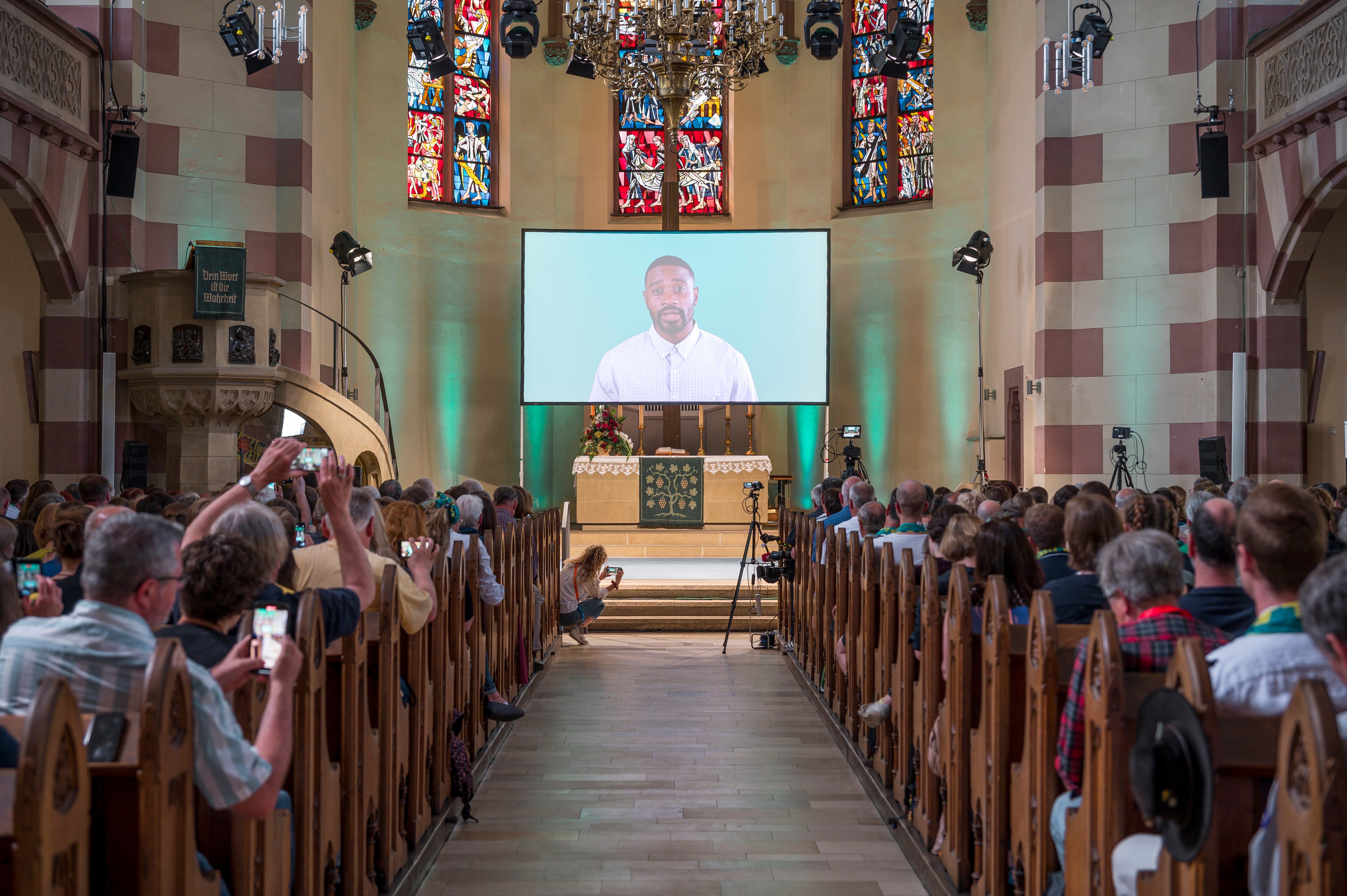 Visitors and attendees during an AI-created worship service in St. Paul Church, Bavaria. Photo: Getty Images