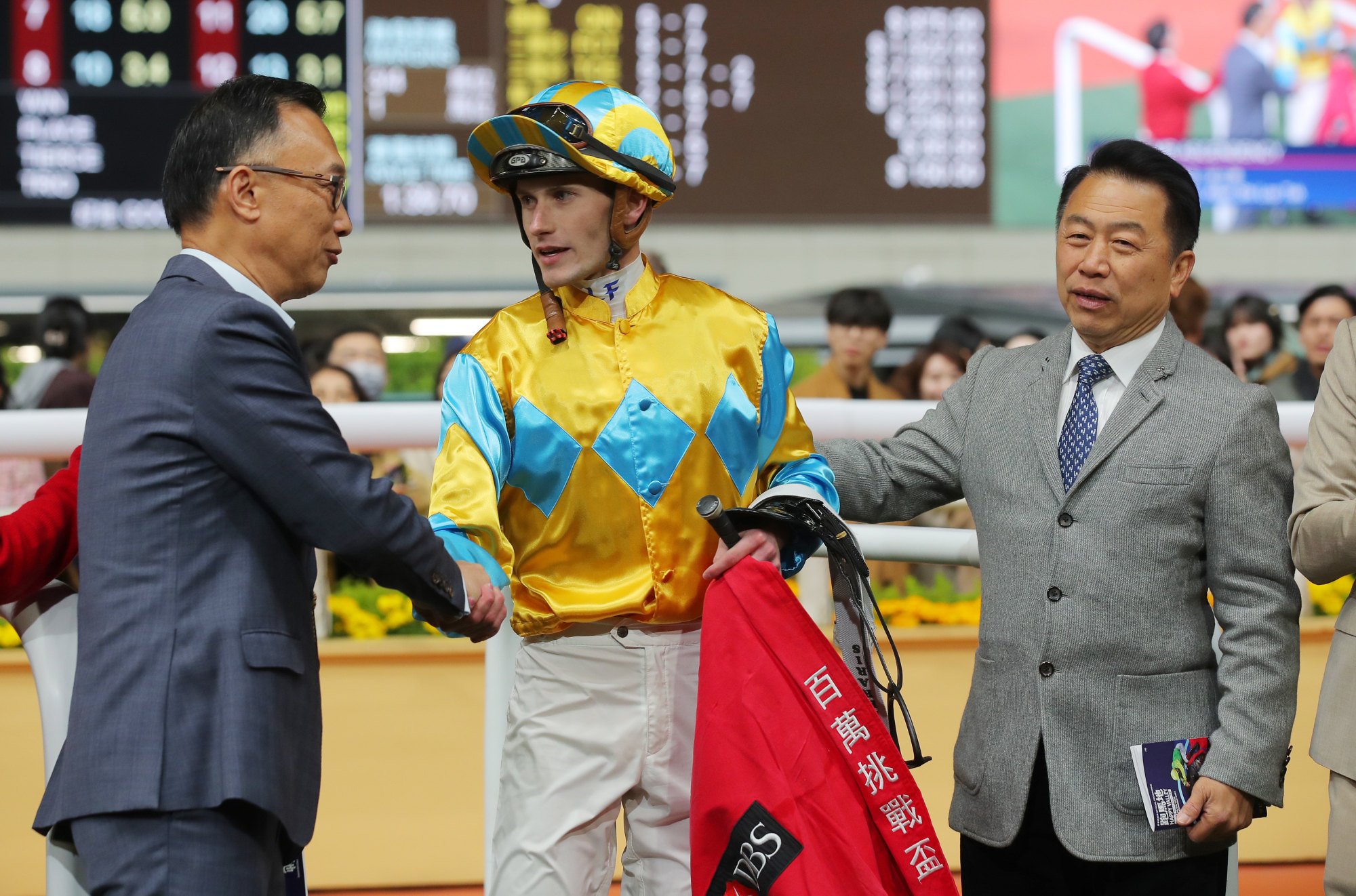 Owner Allen Shi Lop-tak, jockey Luke Ferraris and Ricky Yiu after Mr Ascendency’s Valley victory.