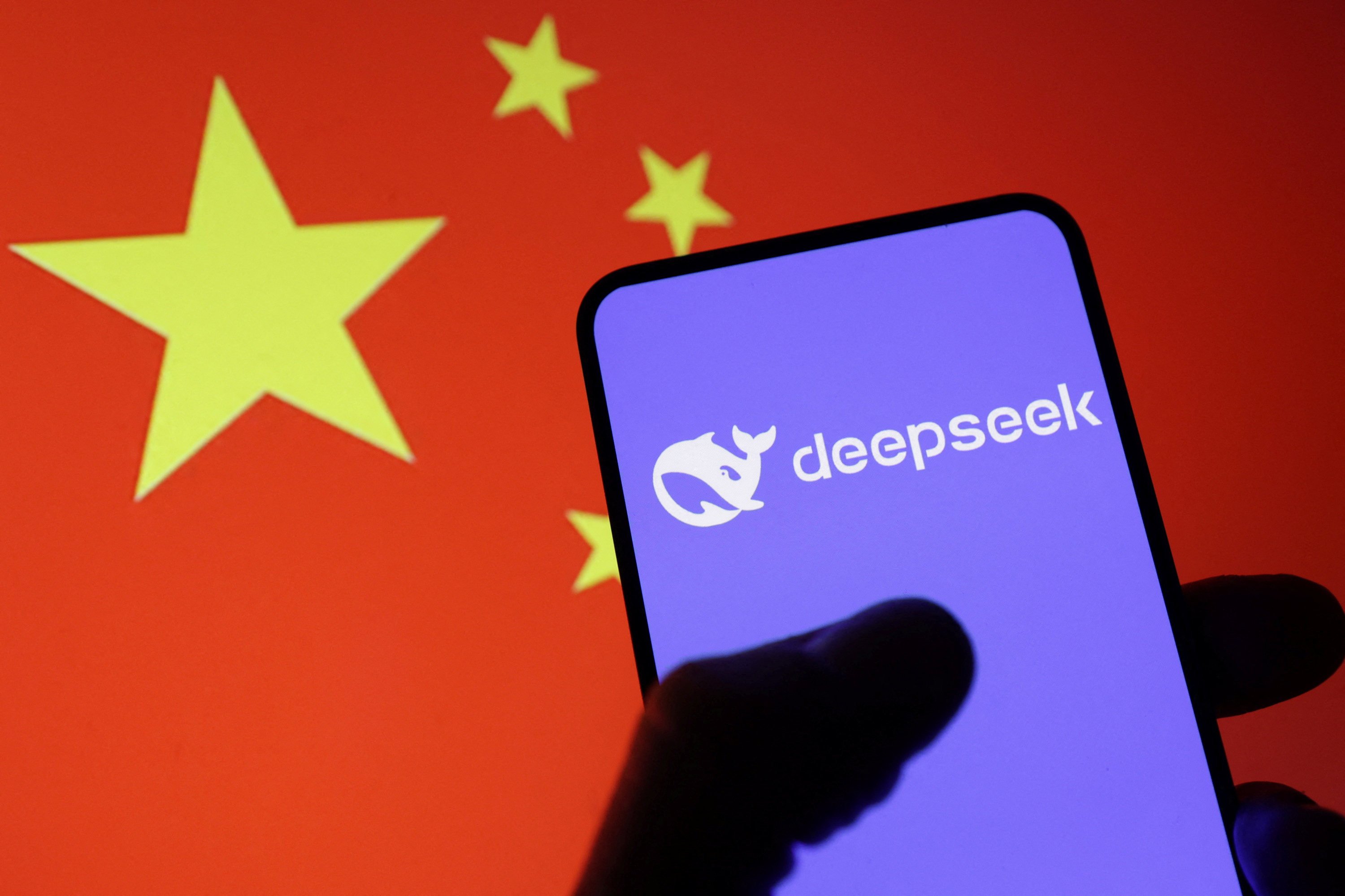 The DeepSeek logo and a Chinese flag. Australia is not the first country to take action against DeepSeek. Photo: Reuters