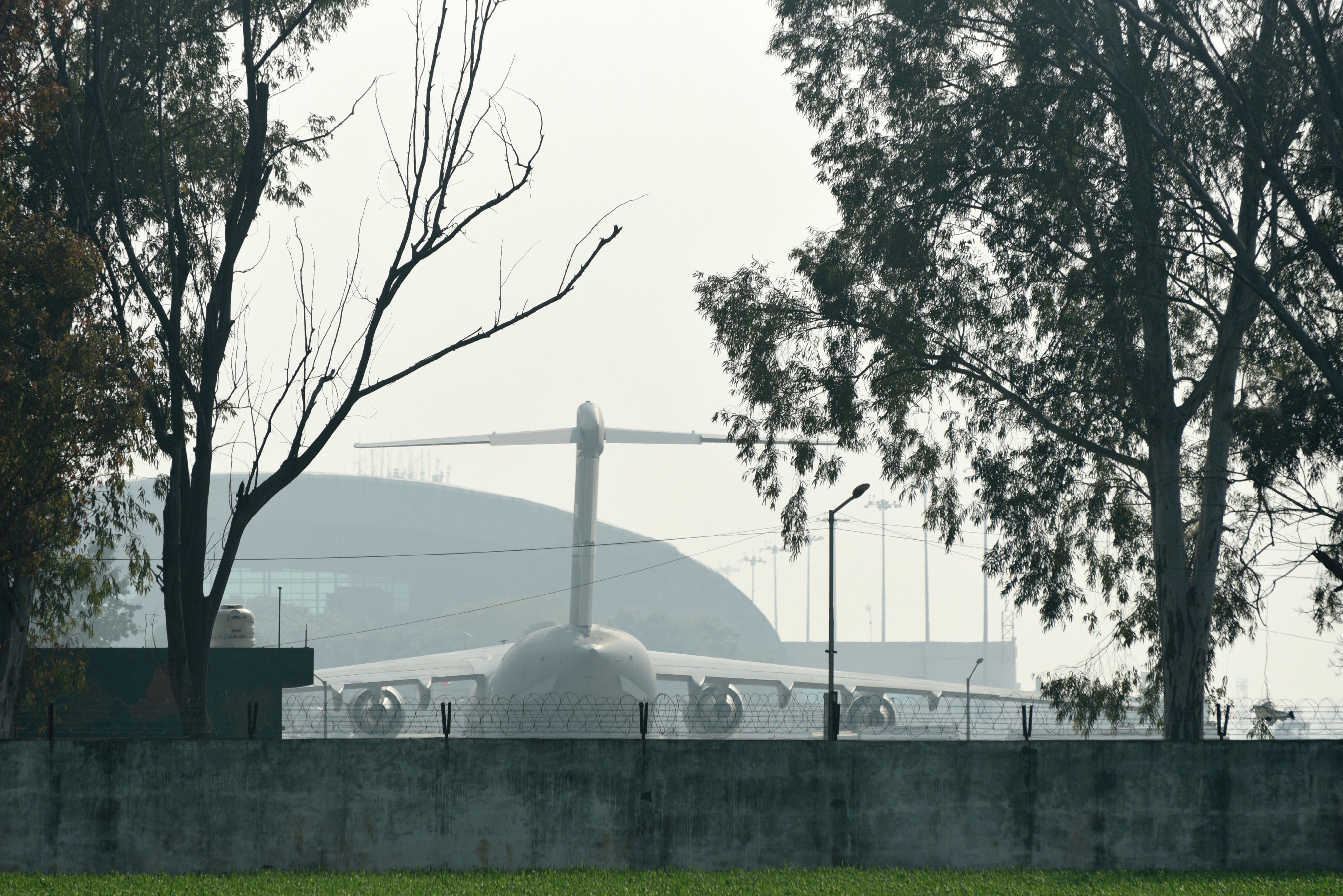 A US military plane which carried deported Indian immigrants is parked at the international airport in Amritsar. Photo: AP