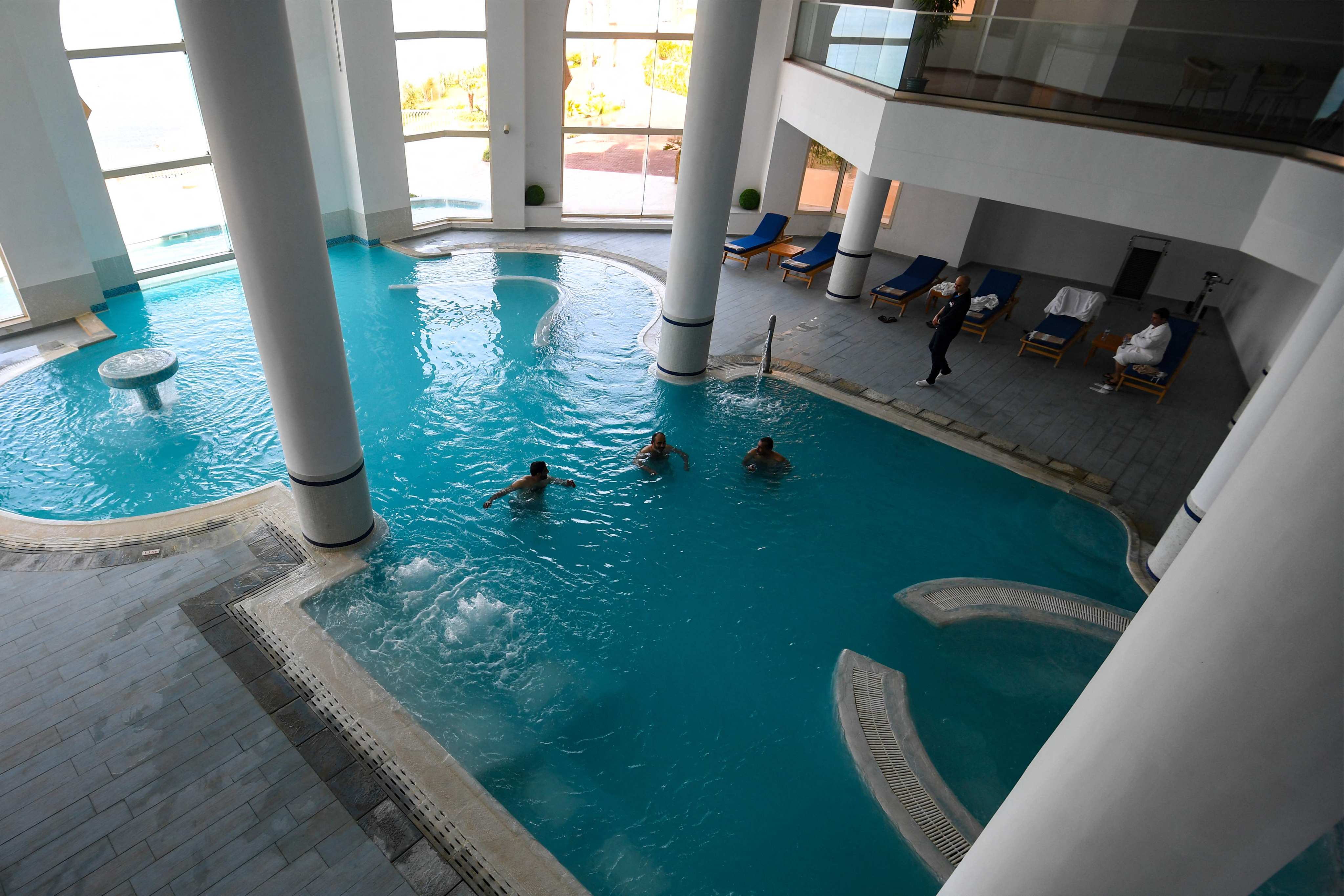 Guests bathe in a thermal pool at a spa in Korbous, Tunisia, on January 25. Photo: AFP