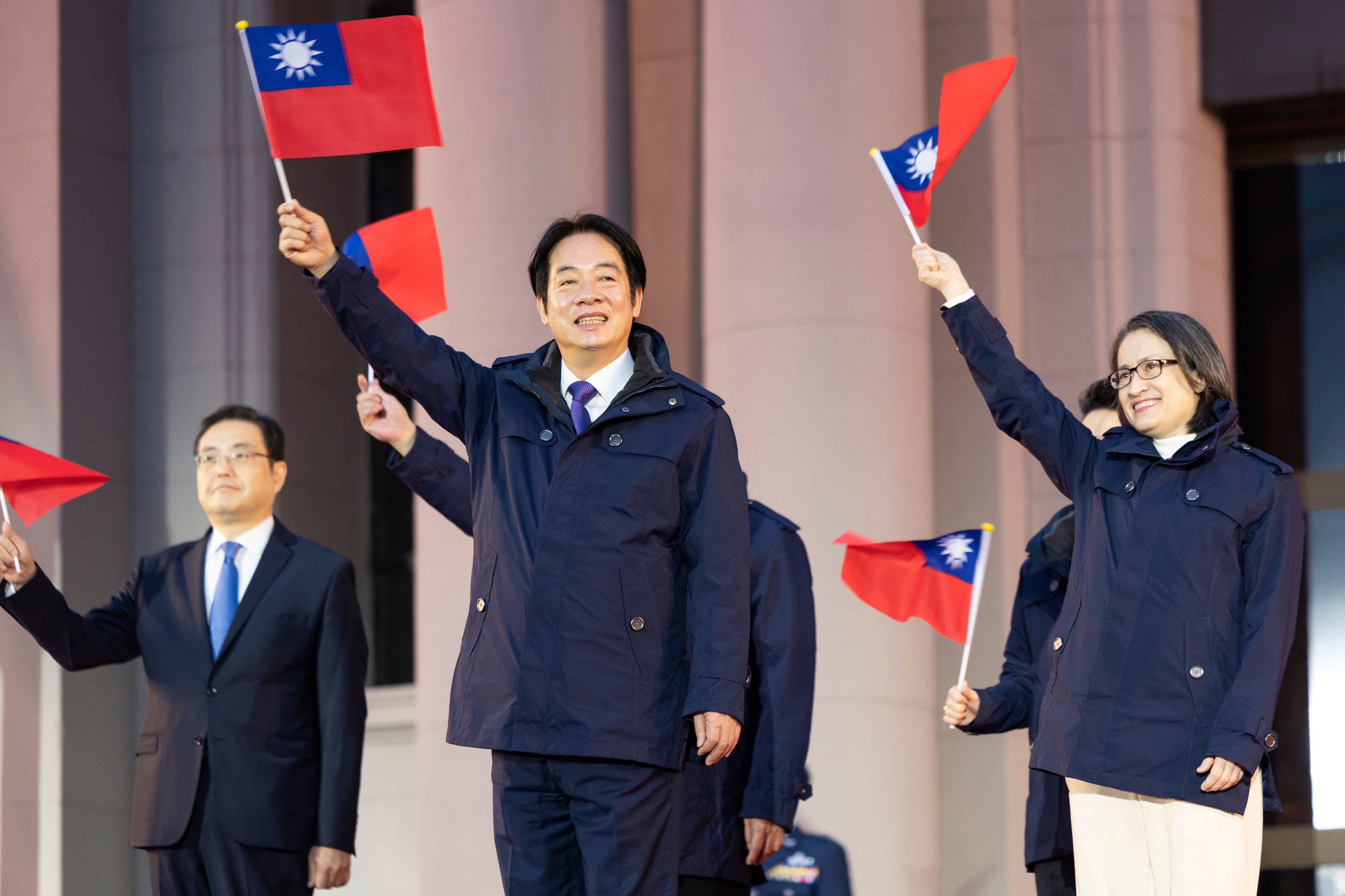 Taiwanese leader William Lai Ching-te (centre) attends a flag-raising ceremony in Taipei, Taiwan on January 1. Photo: AP