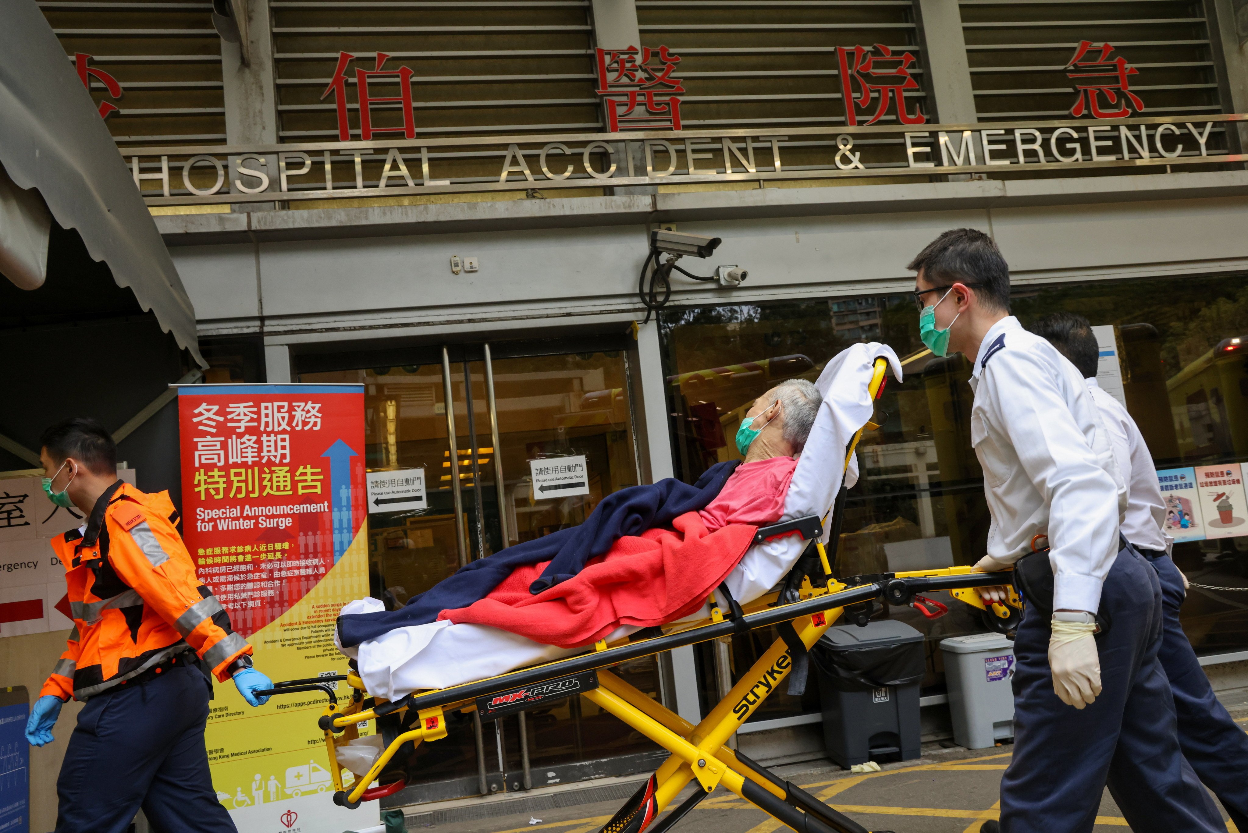 A patient is wheeled into the accident and emergency department at Queen Elizabeth Hospital in Yau Ma Tei on January 31. Photo: Jelly Tse