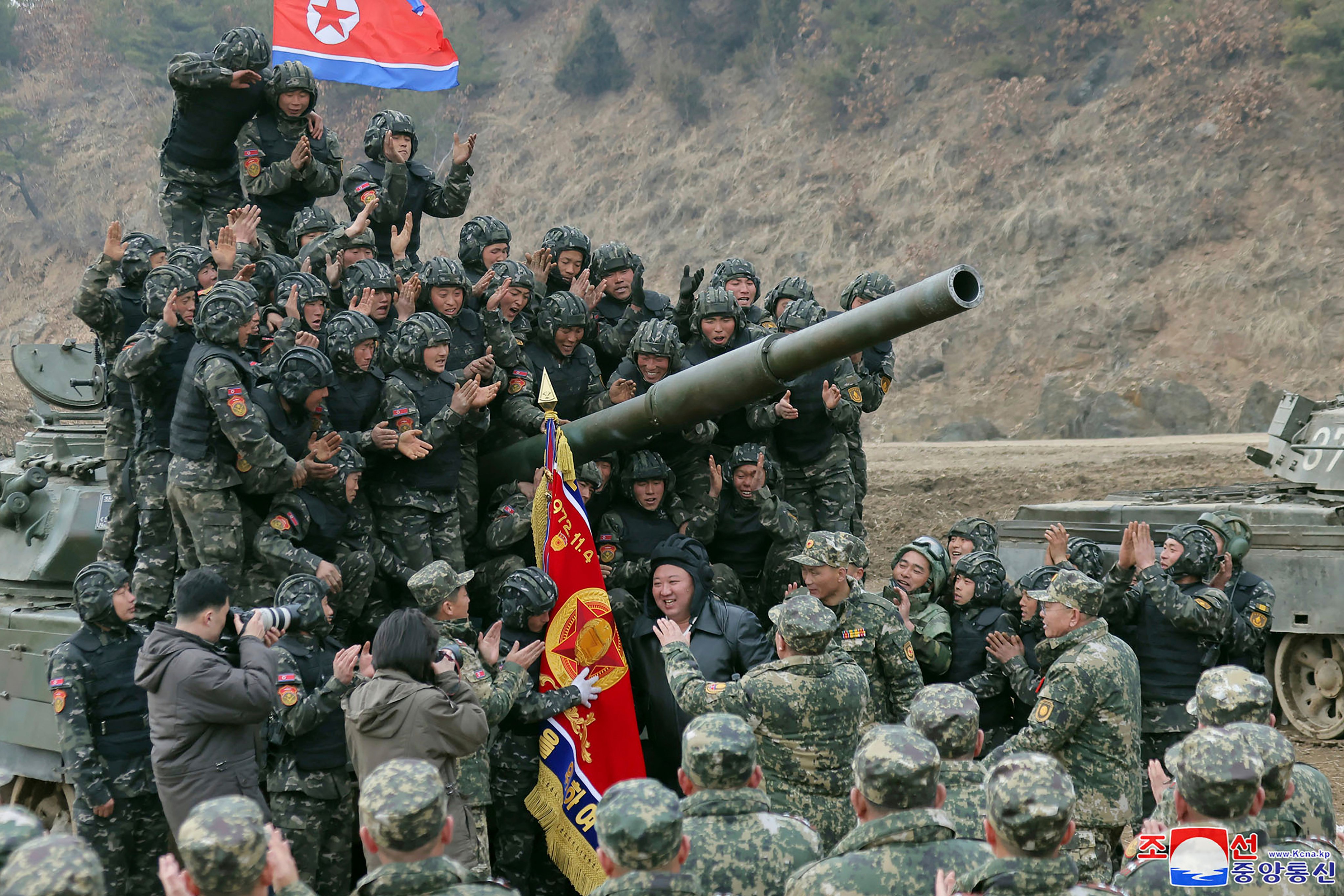 North Korean leader Kim Jong- un meets soldiers during a training in North Korea. Photo: AP