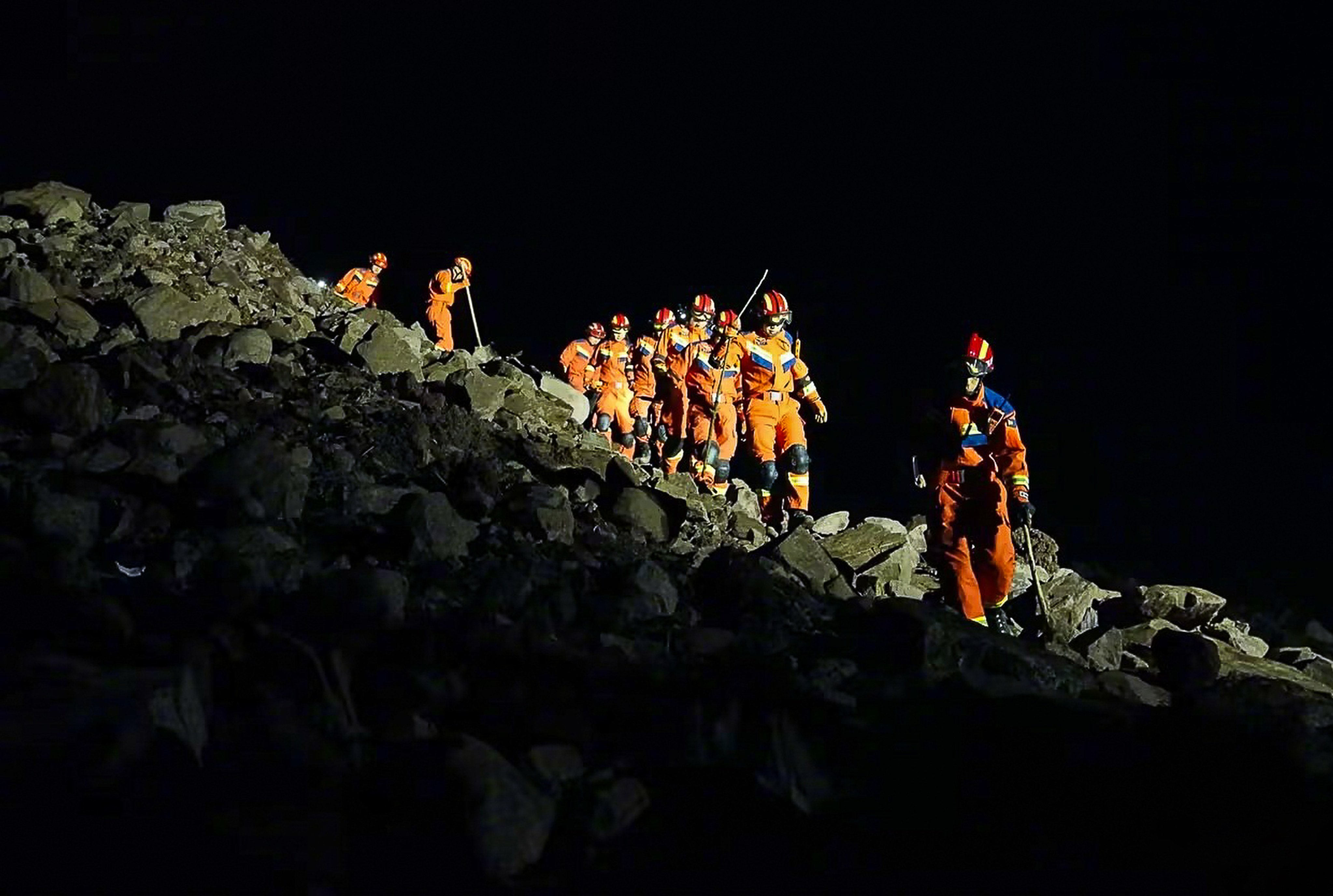 Rescuers resumed the search on Sunday morning for dozens of people missing after a landslide in southwestern China. Photo: Yibin Fire Services