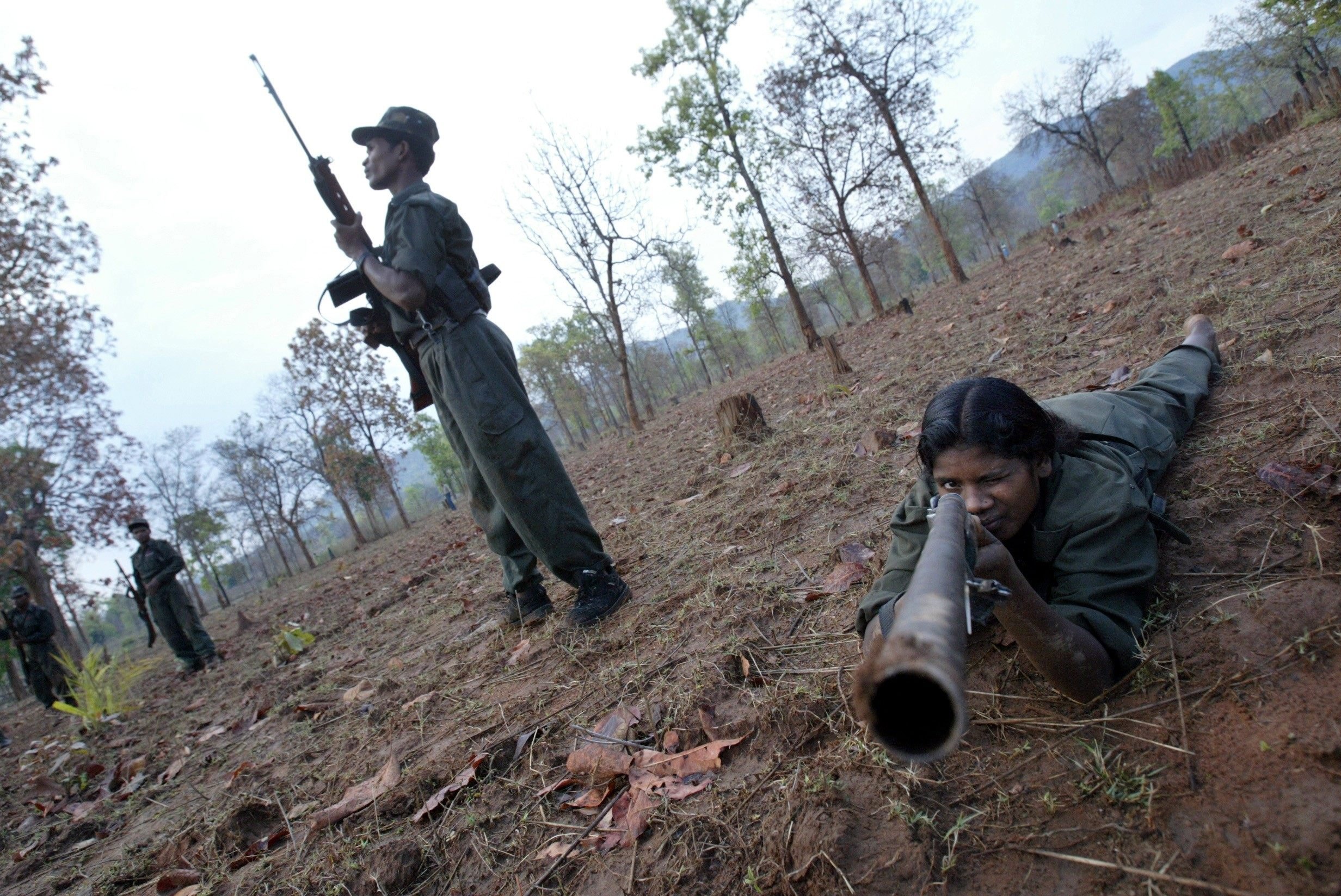 Members of the Naxalites, officially the Communist Party of India (Maoist), exercise at a temporary base in the Abujh Marh forests, in the central Indian state of Chattisgarh, in 2007. Photo: AP