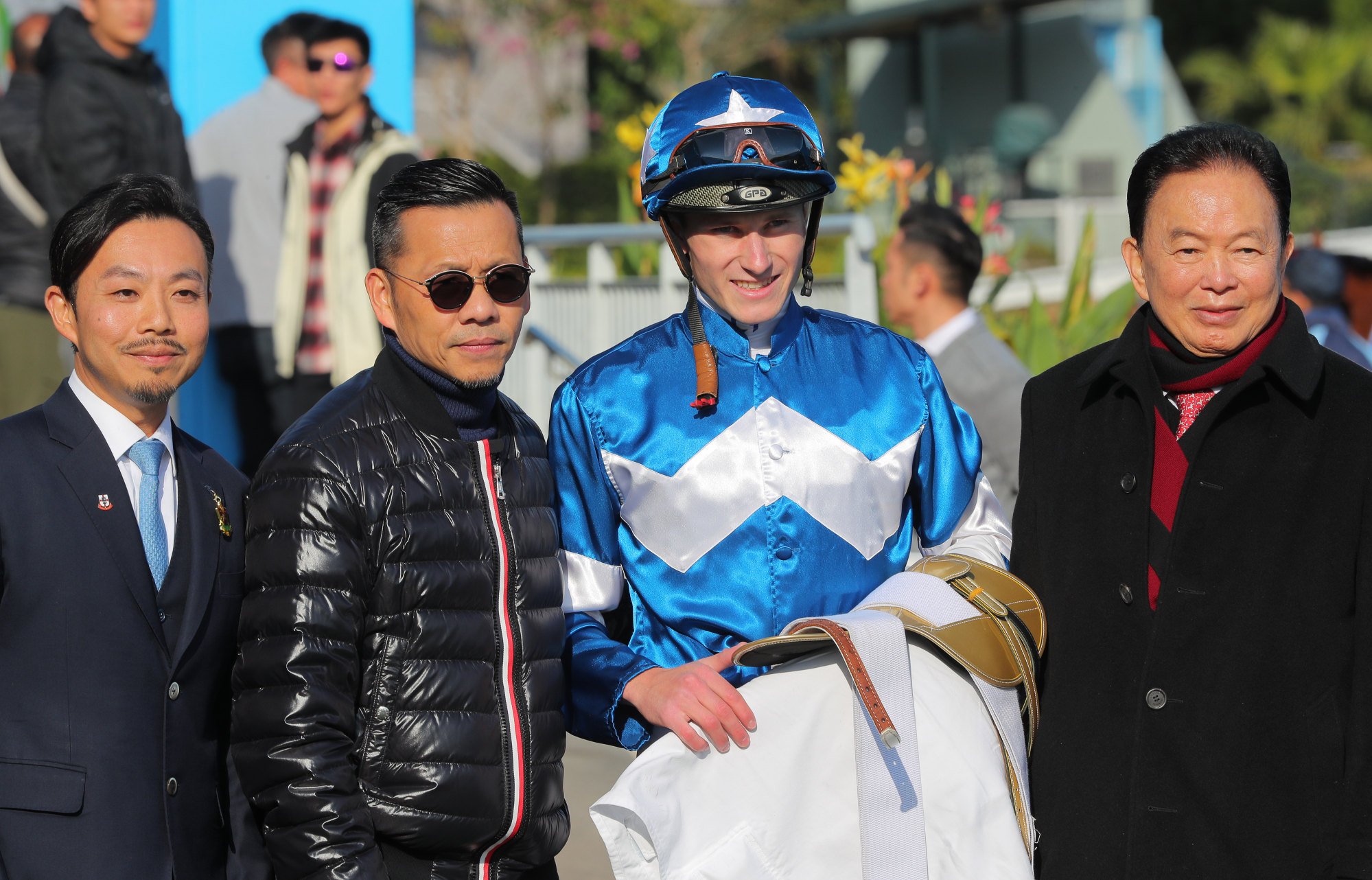 Trainer Frankie Lor (second from left), jockey Luke Ferraris and connections of Lucky With You celebrate.