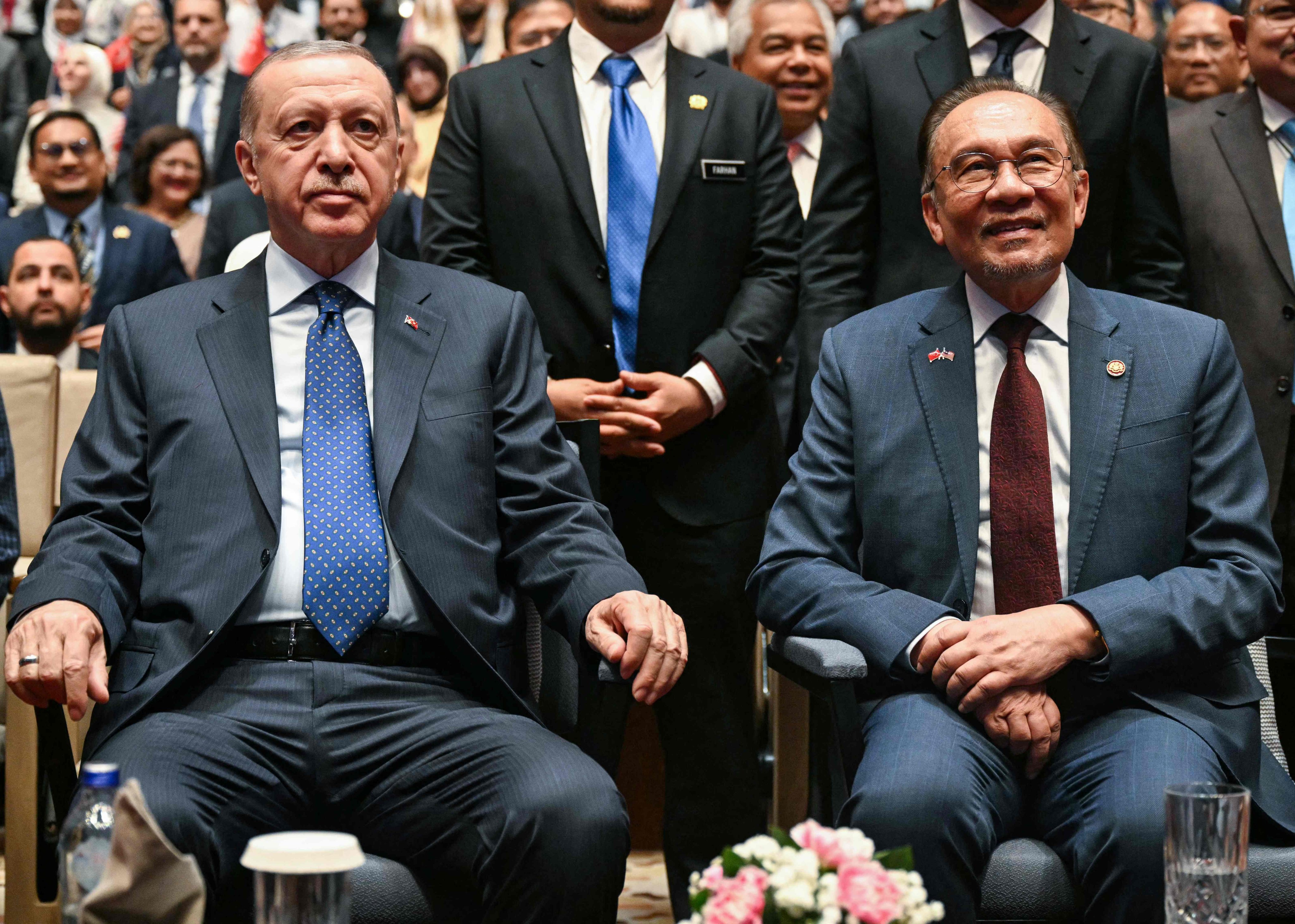 Turkey’s President Recep Tayyip Erdogan and Malaysia’s Prime Minister Anwar Ibrahim attend a public lecture in Putrajaya on Monday. Photo: AFP