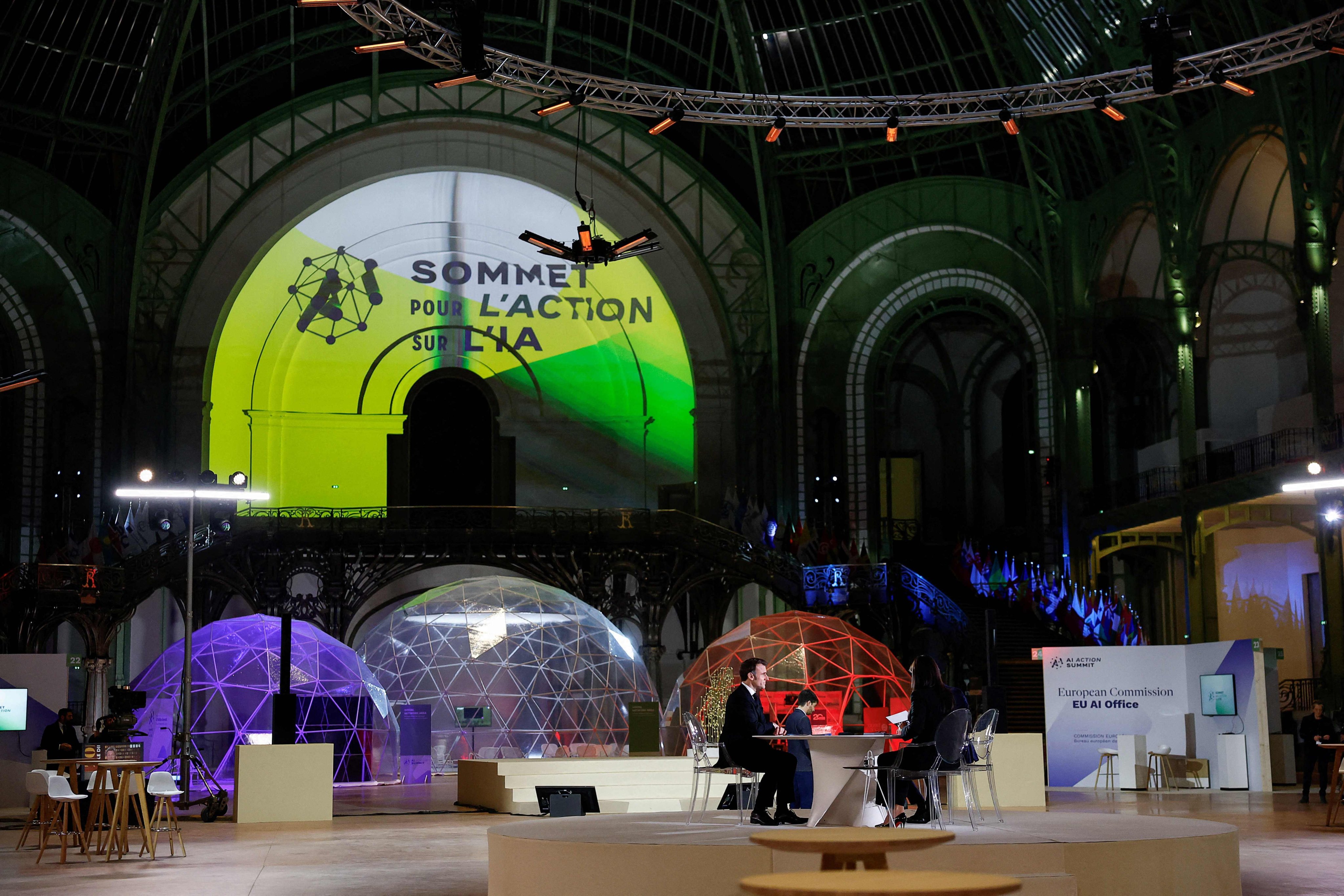 French President Emmanuel Macron answers journalists’ questions on the eve of the Artificial Intelligence (AI) Action Summit, at the Grand Palais in Paris, France on Sunday. Photo: AFP