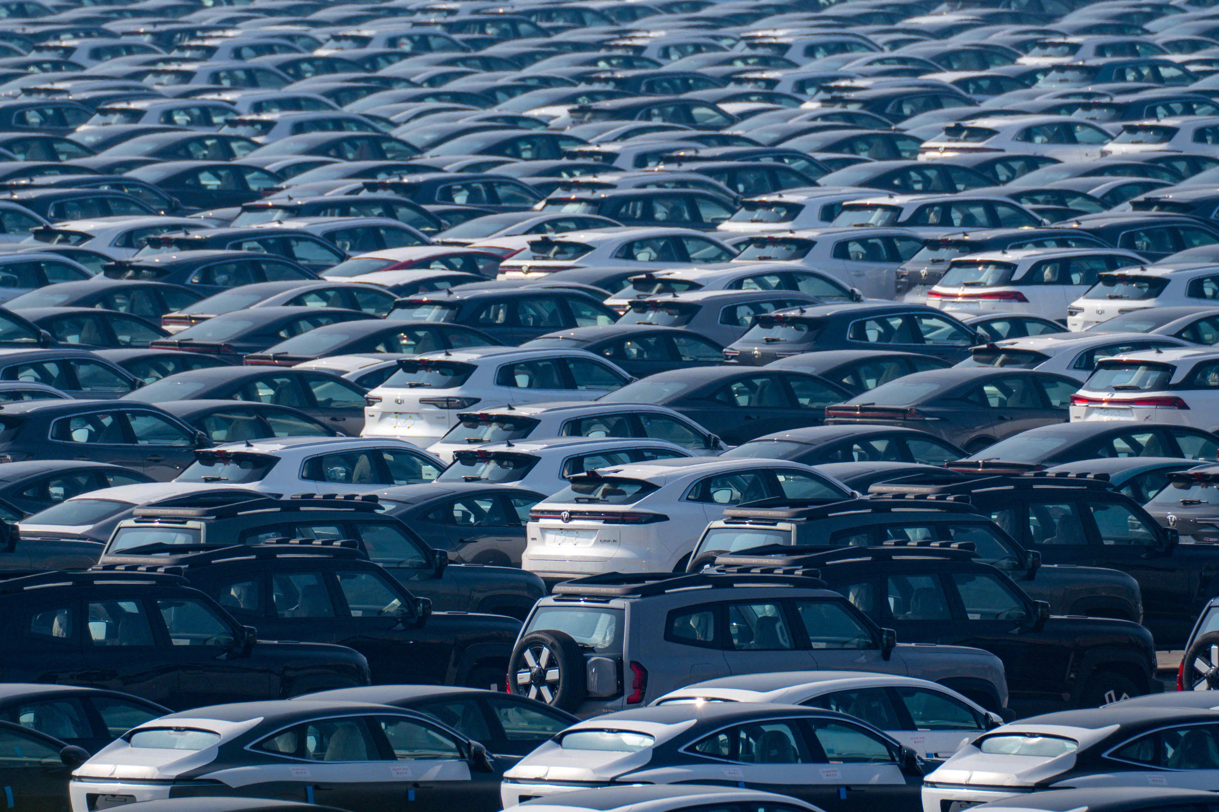 New cars await transport in a distribution center of Chinese state-owned automobile manufacturer Changan in southwest China’s Chongqing municipality on January 12, 2025. Photo: AFP