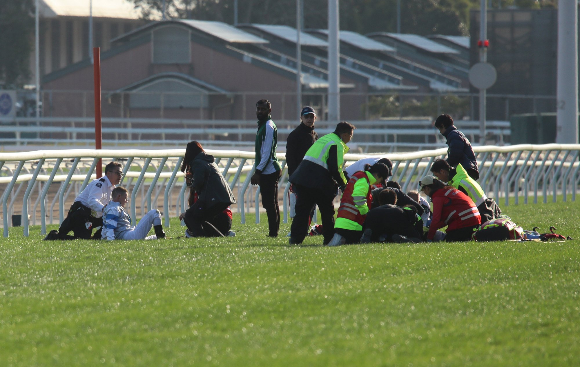 Jockey Zac Purton (left) gets his bearings after Sunday’s nasty tumble.