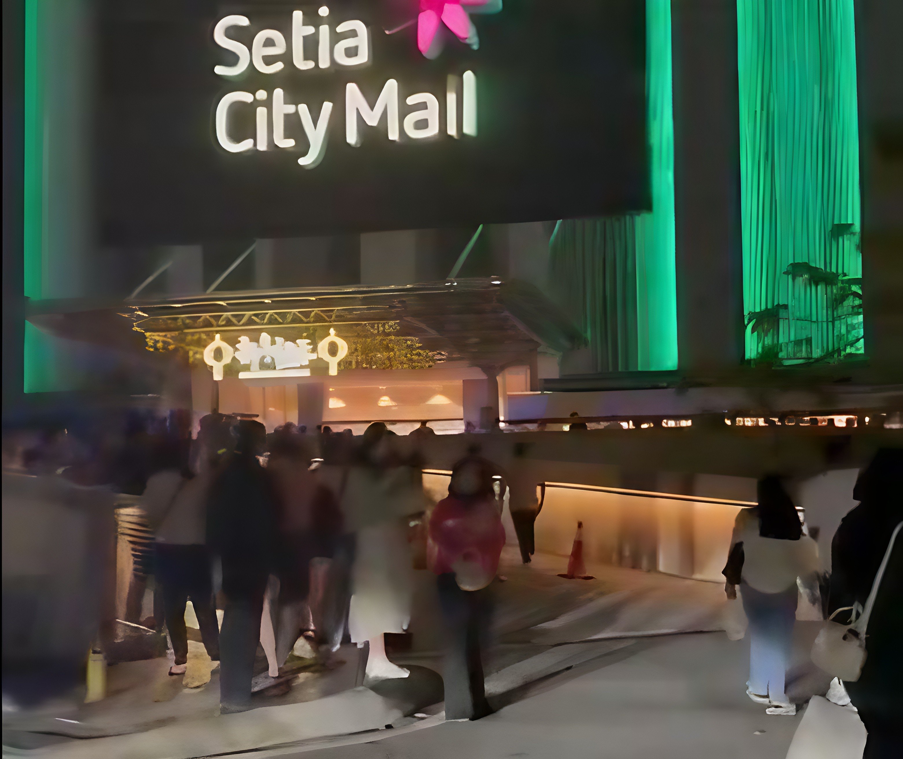 Shoppers are seen gathered outside Setia City Mall in Malaysia on Saturday night after the shooting at the shopping centre, in this still from a social media video. Photo: X/skynewsagra