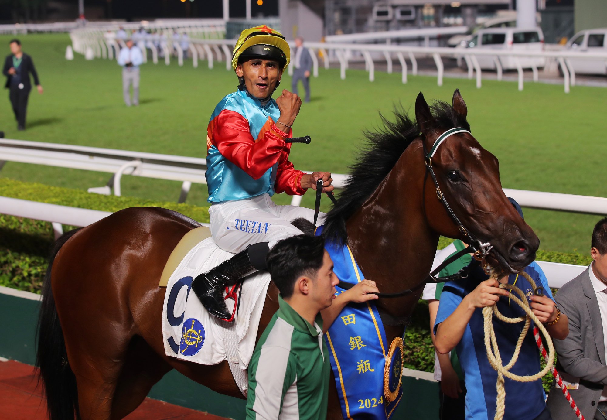 Karis Teetan celebrates his victory aboard Ka Ying Rising.