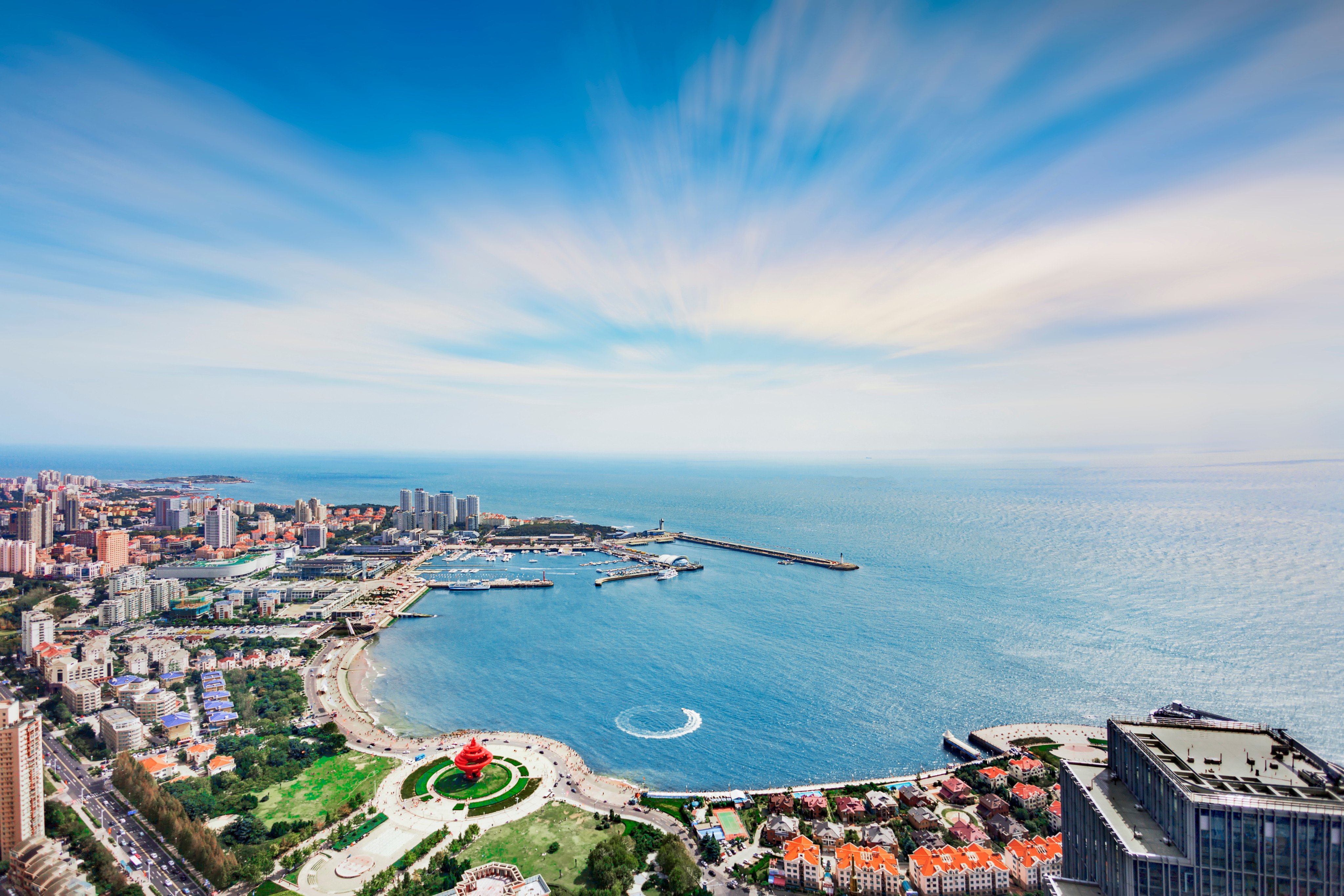 The May Fourth Square (front) and its red “May Wind” sculpture are seen overlooking Fushansuo Bay in Qingdao, in China’s eastern Shandong province. Photo: Shutterstock