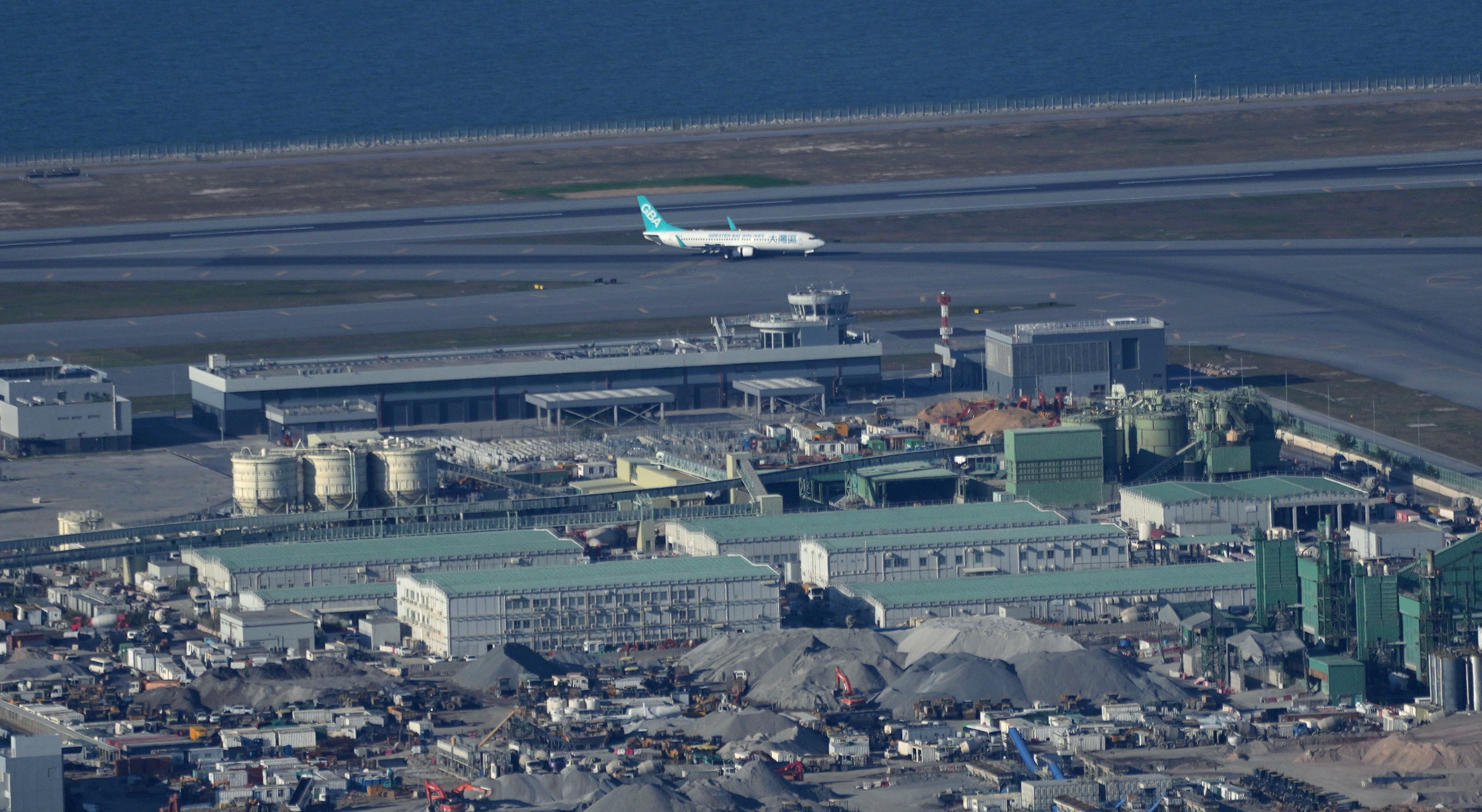 A plane lands on the third runway at Hong Kong International Airport on November 28, 2024. The Airport Authority’s HK$100 billion Skytopia project aims to transform the airport into an airport city rivalling the best in the world. Photo: Elson Li