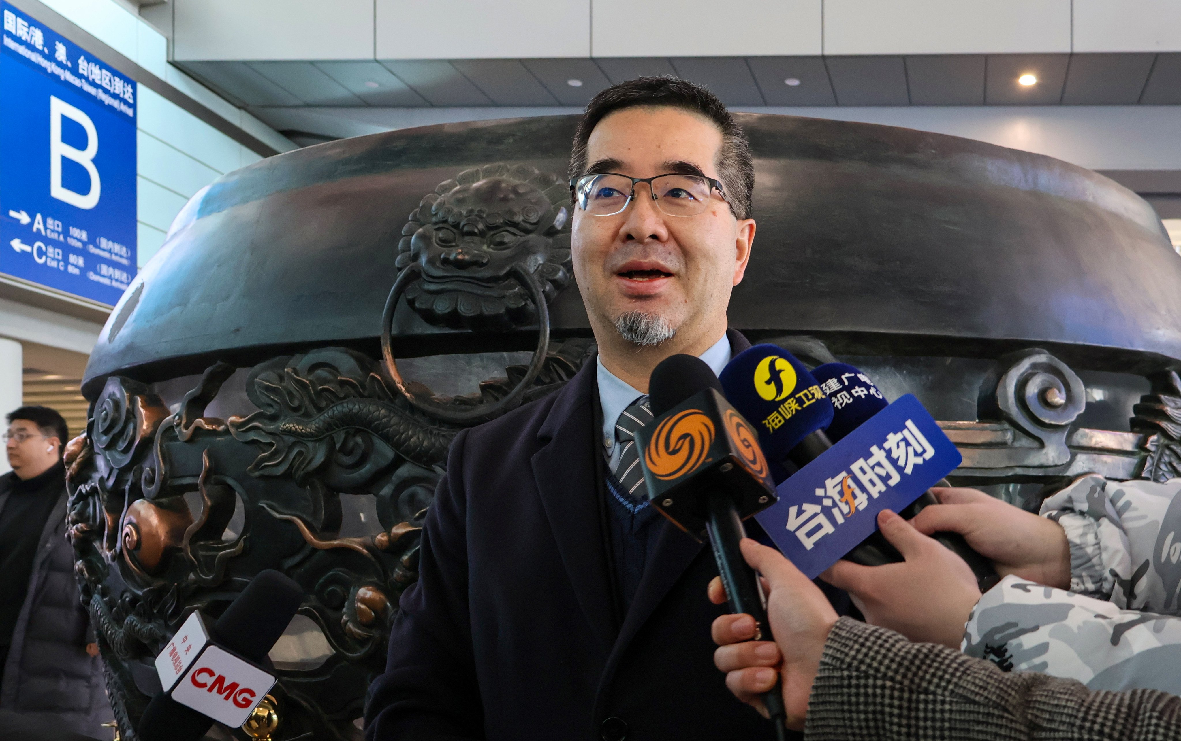 Hsiao Hsu-tsen, executive director of the Ma Ying-jeou Foundation, speaks to reporters after the Taiwanese group arrived in Beijing on Monday. Photo: CNA