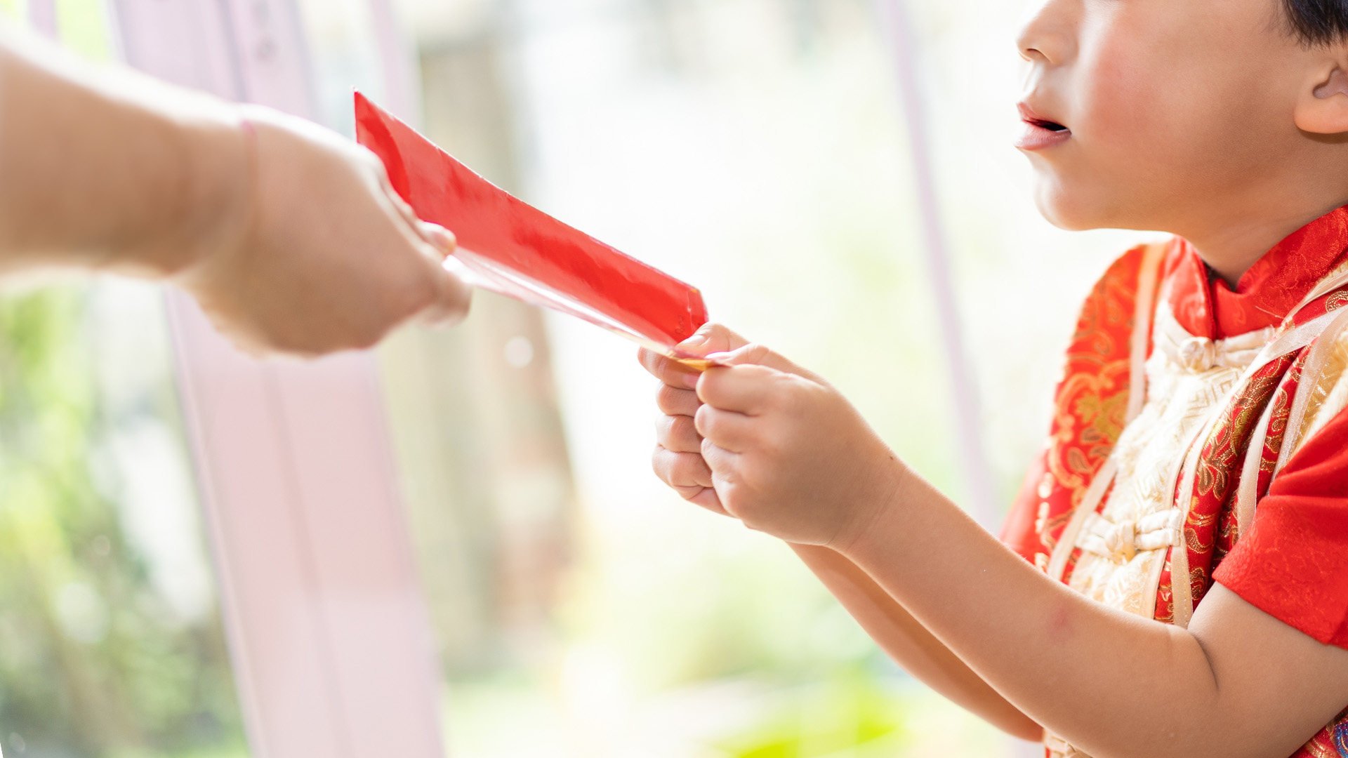 A young boy in China called the police to report a robbery after his father kept his Lunar New Year lucky money. Photo: Shutterstock