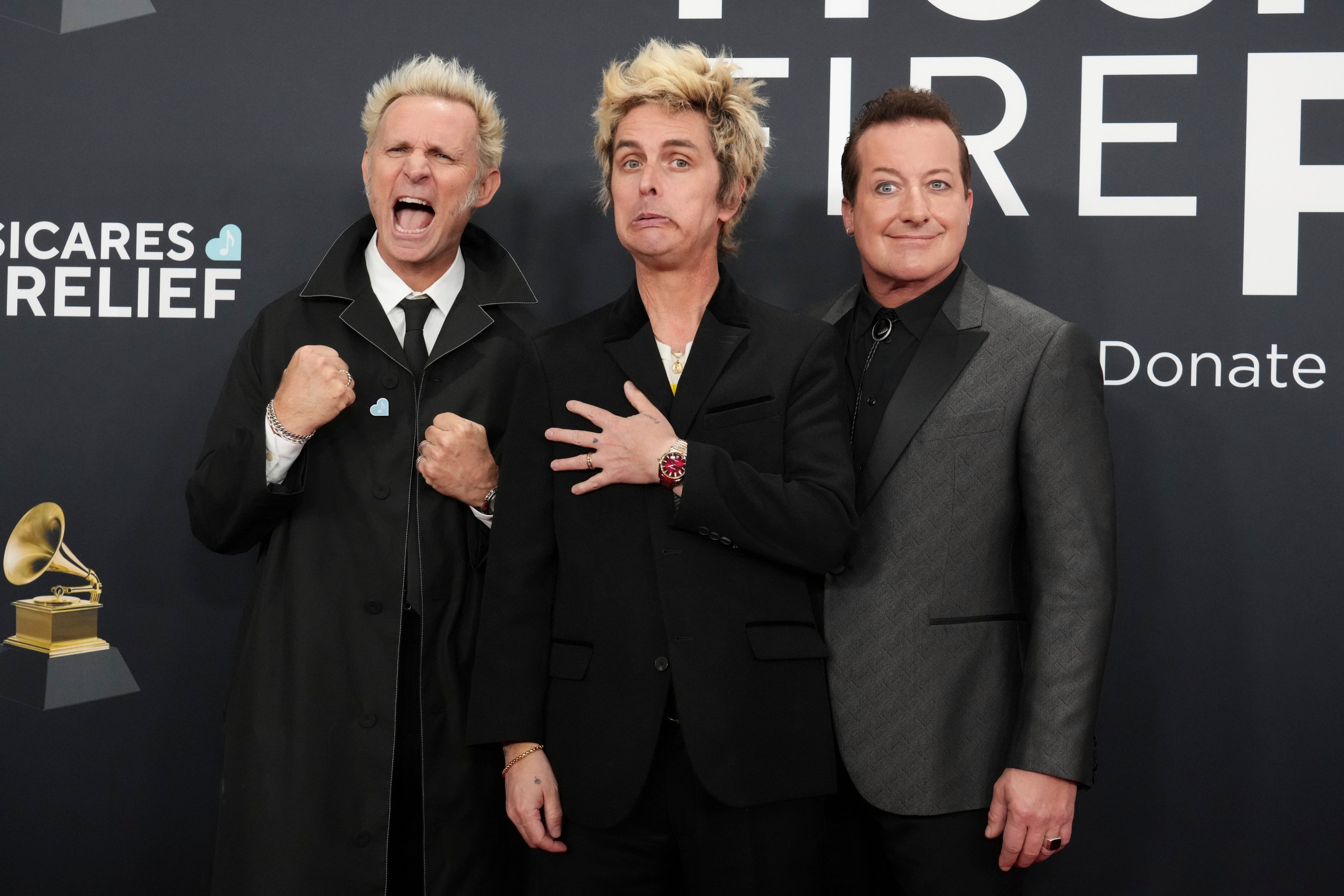 Mike Dirnt, Billie Joe Armstrong and Tre Cool of US band Green Day at the 67th annual Grammy Awards this month. They are set to perform at the National Hockey Stadium in Kuala Lumpur next week. Photo: Invision/AP