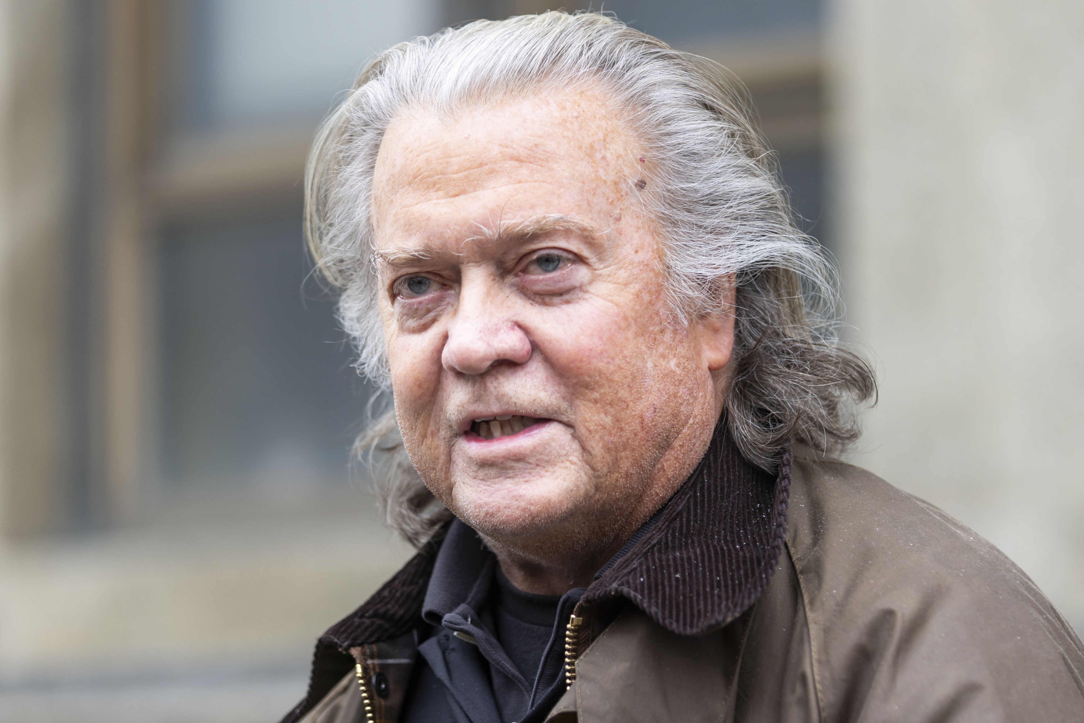 Steve Bannon talks to reporters outside a New York courthouse after pleading guilty to fraud charges on Tuesday. Photo: EPA-EFE