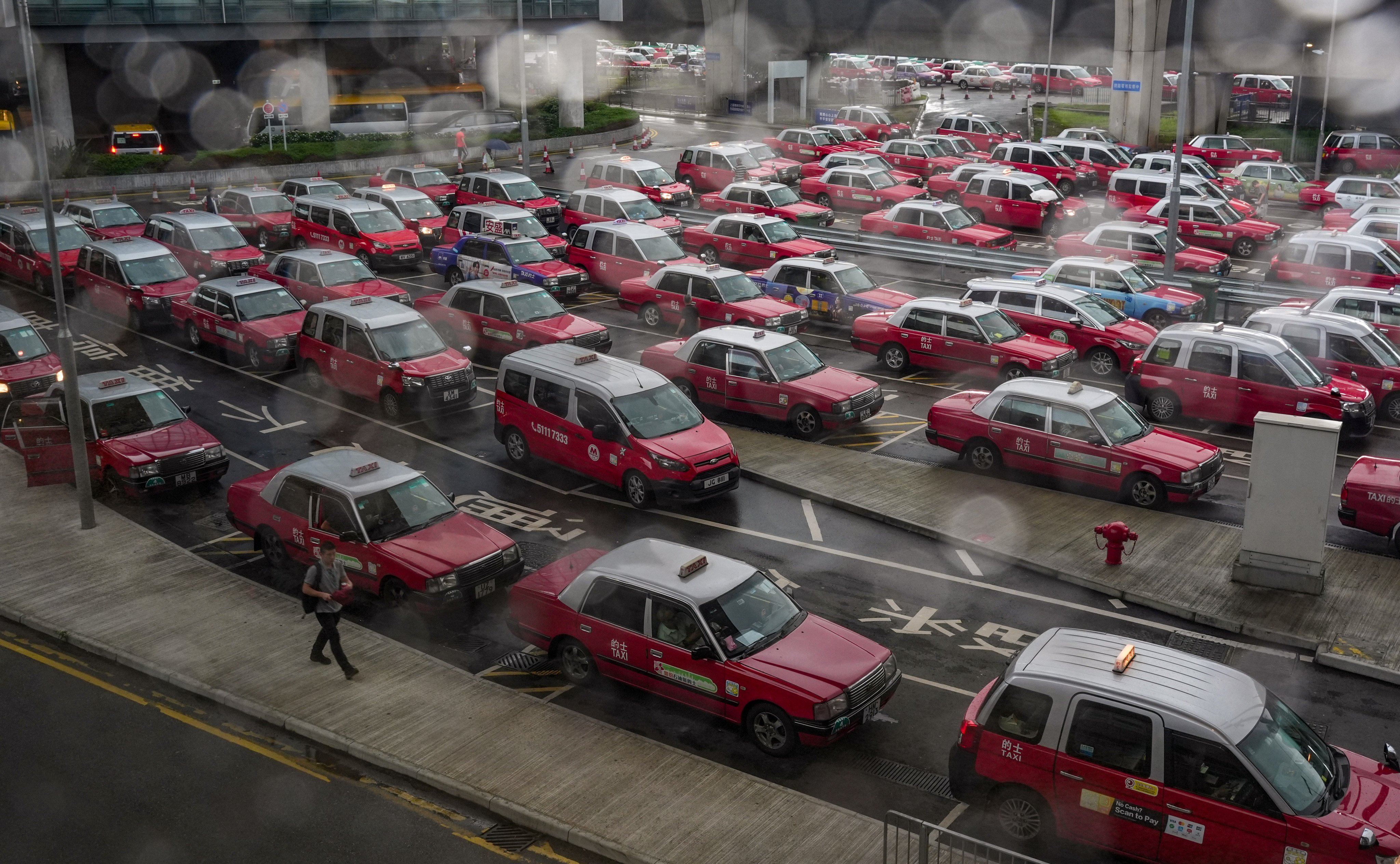 Hong Kong has 46,000 taxi drivers, with 18,163 cabs on the road. Photo: Eugene Lee