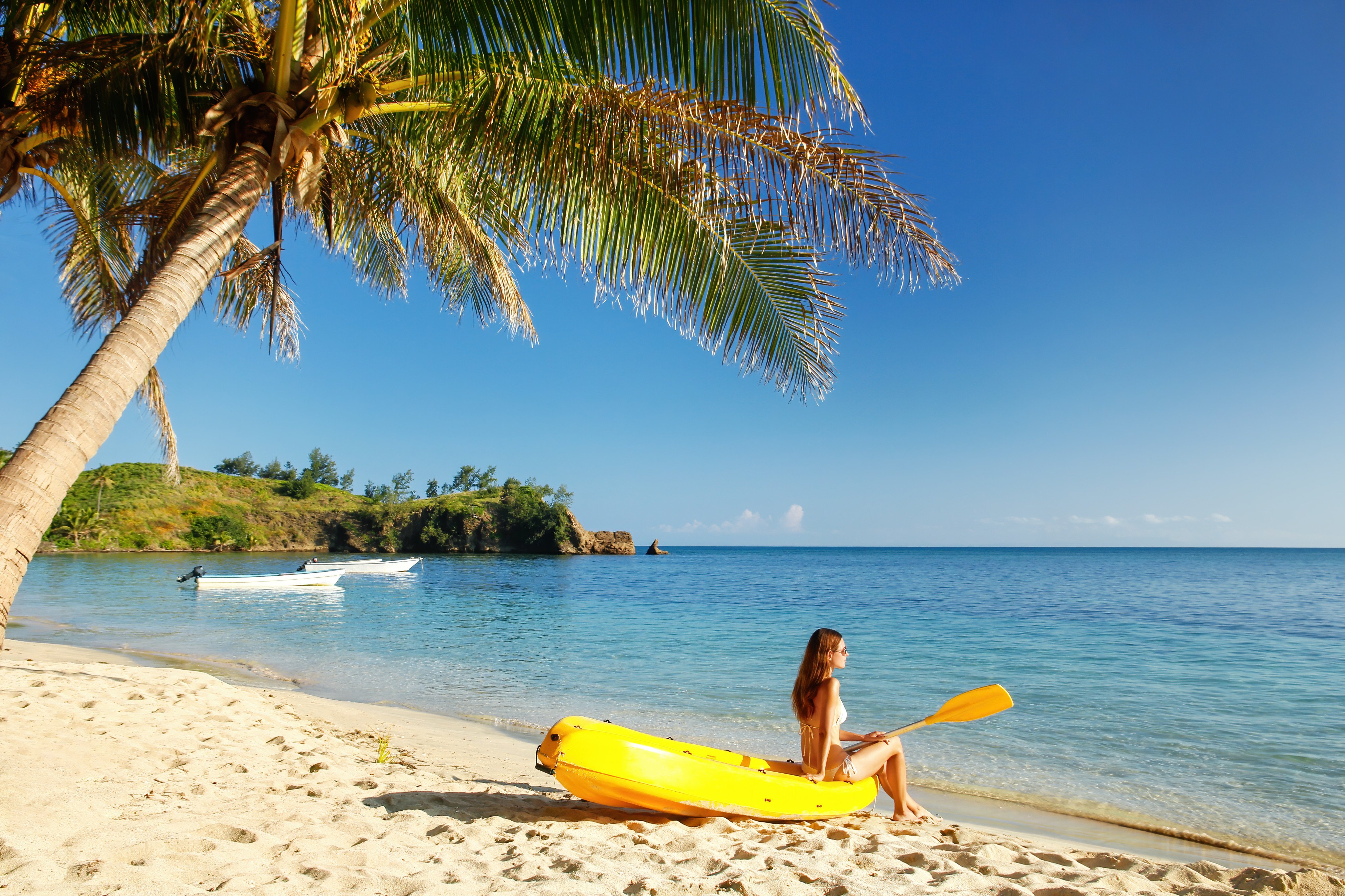 A kayaker pulled up on the beach on Nacula Island in the Yasawa archipelago, Fiji. Photo: Shutterstock