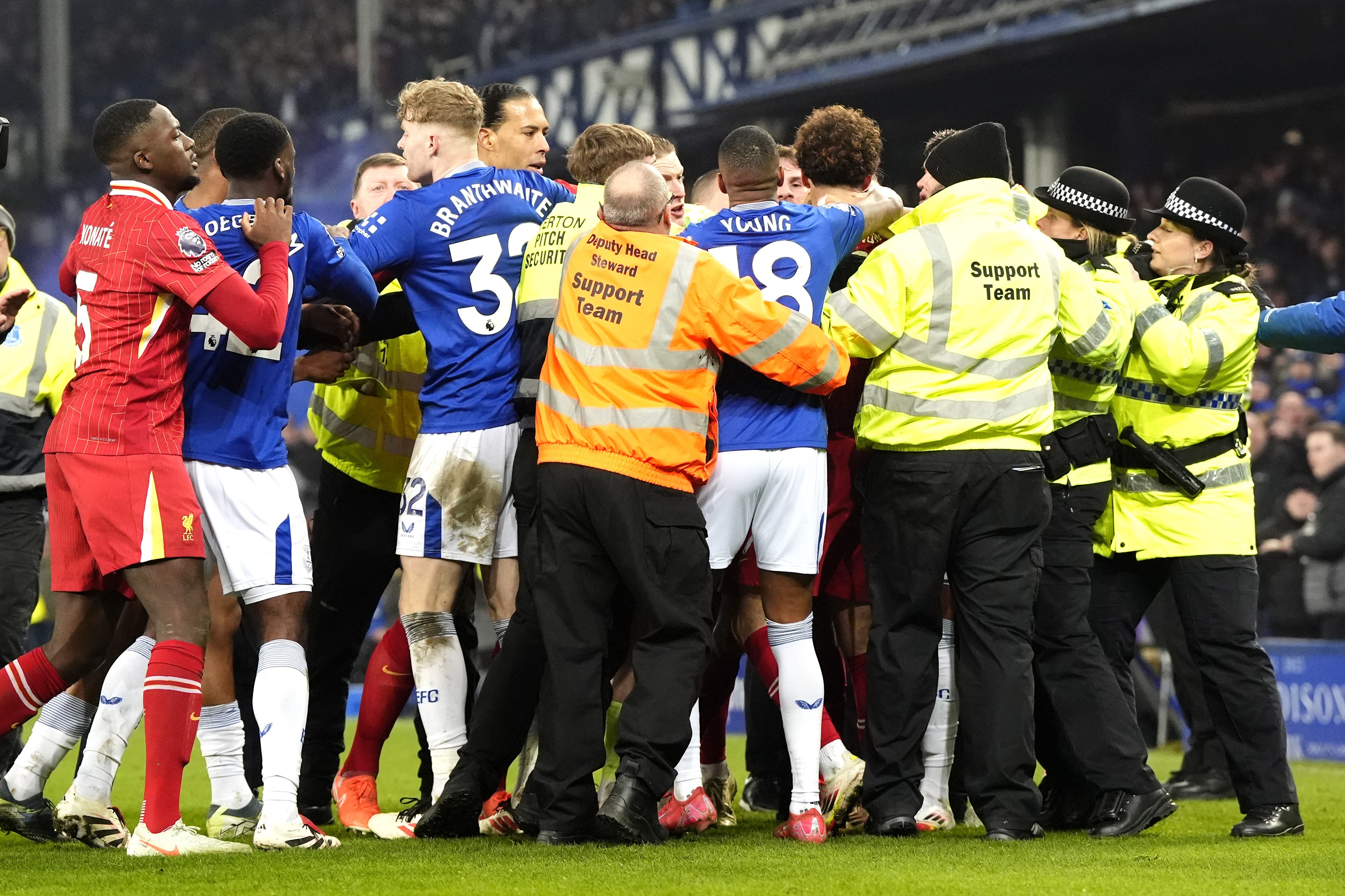 Liverpool and Everton players clash after the final whistle at Goodison Park. Photo: dpa