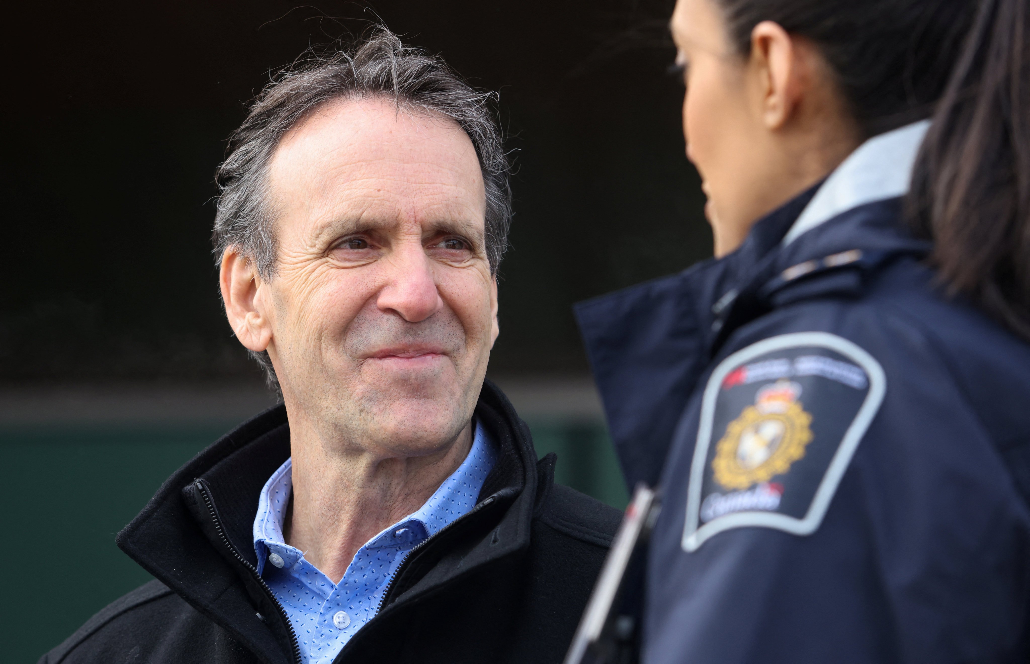 Newly appointed fentanyl tsar, Kevin Brosseau (left), chats with Jag Johnston of the Canada Border Service Agency at the Lansdowne Port of Entry in Ontario, Canada, on Wednesday. Photo: Reuters