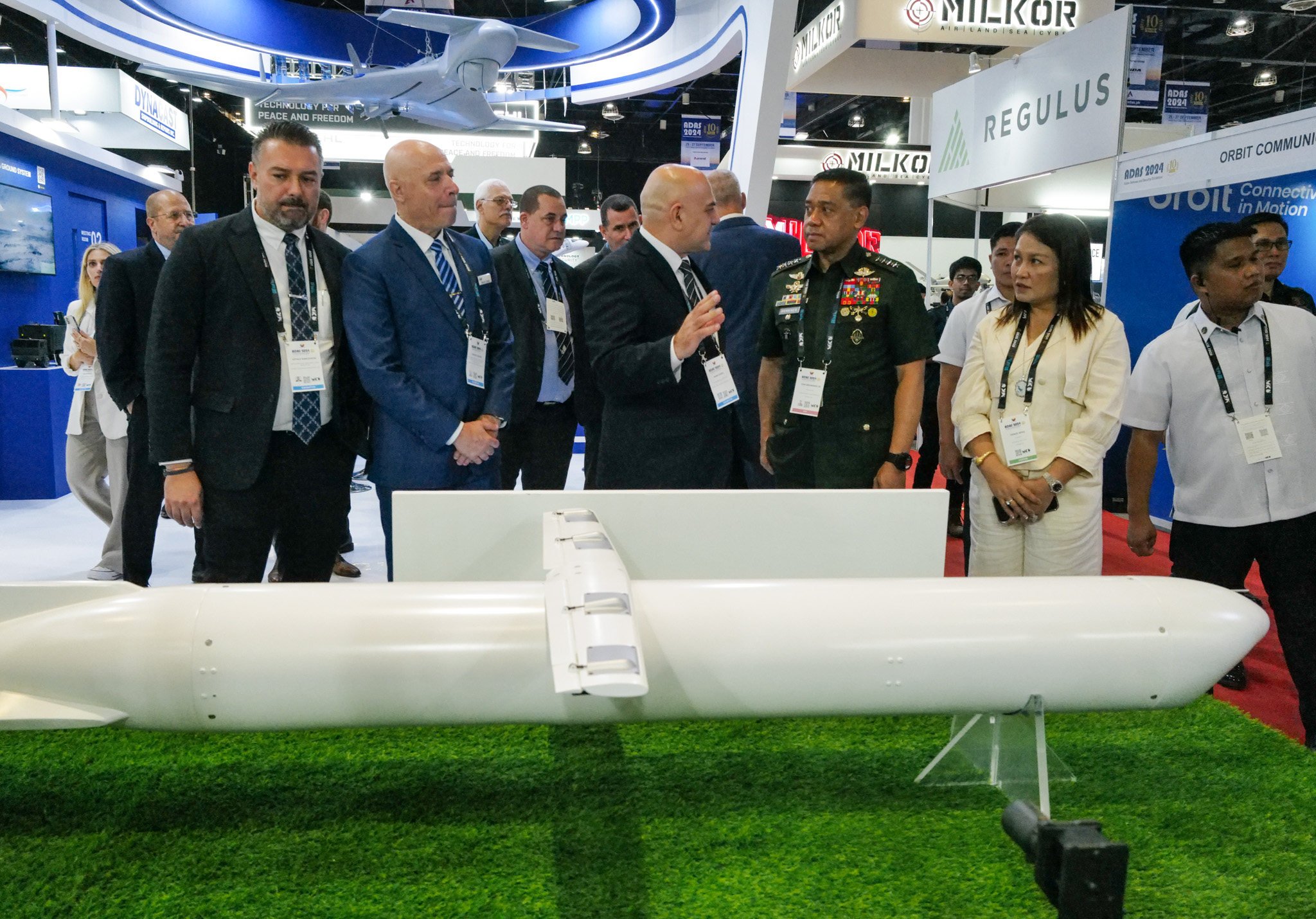 General Romeo Brawner Jnr ( 2nd from right), Armed Forces of the Philippines chief, listens to an underwater drone explanation of an exhibitor at the 5th Asian Defence and Security Exhibition in Manila last year. Photo: Jeoffrey Maitem