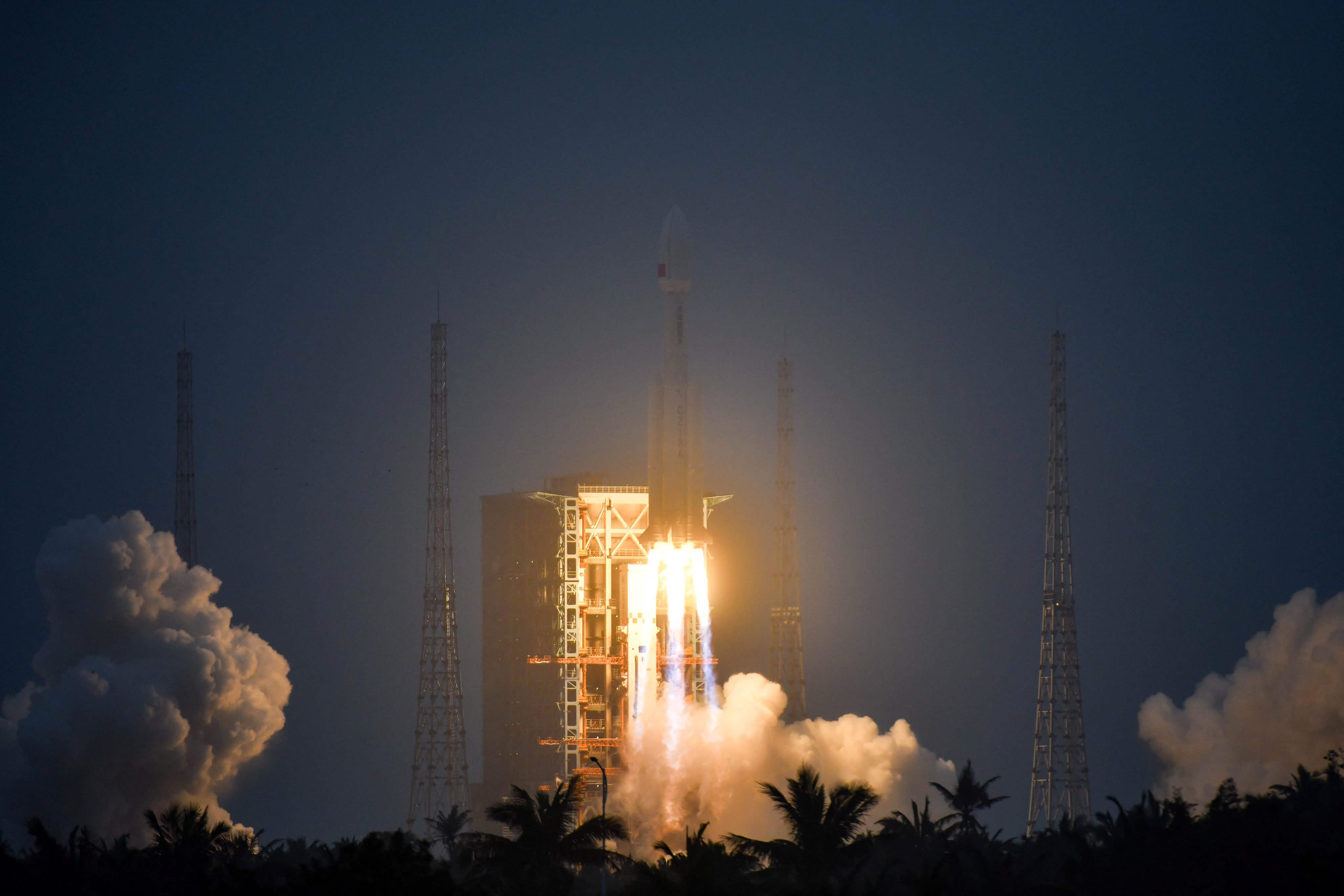 A Long March 8A rocket, carrying a group of low-Earth orbit satellites, launches from the Wenchang Space Launch Center in Hainan province on Tuesday. Photo: CNSPhoto via Reuters