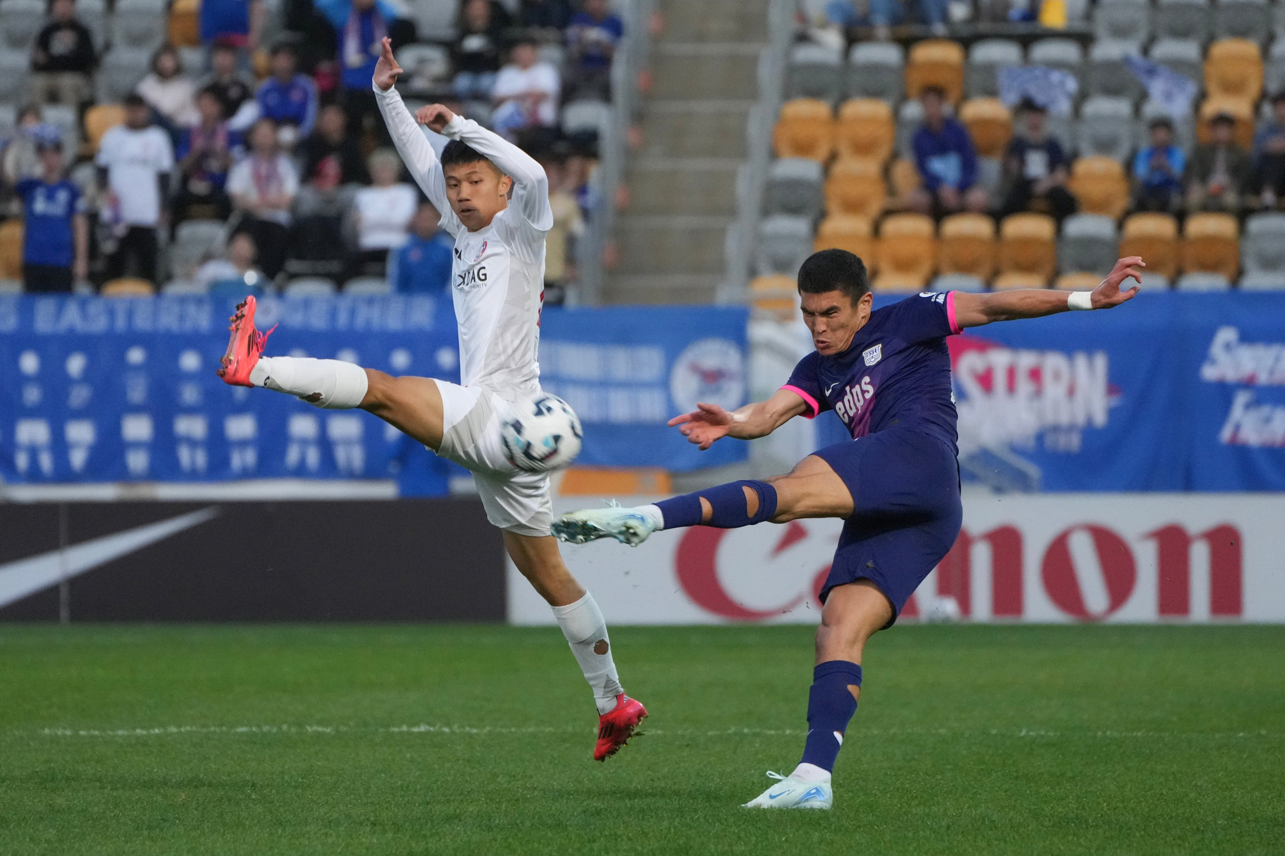 Sherzod Temirov tries to blast a shot past the blocking Timmy Ma Hei-wai during Kitchee’s 3-0 victory over Eastern this month. Photo: Sam Tsang