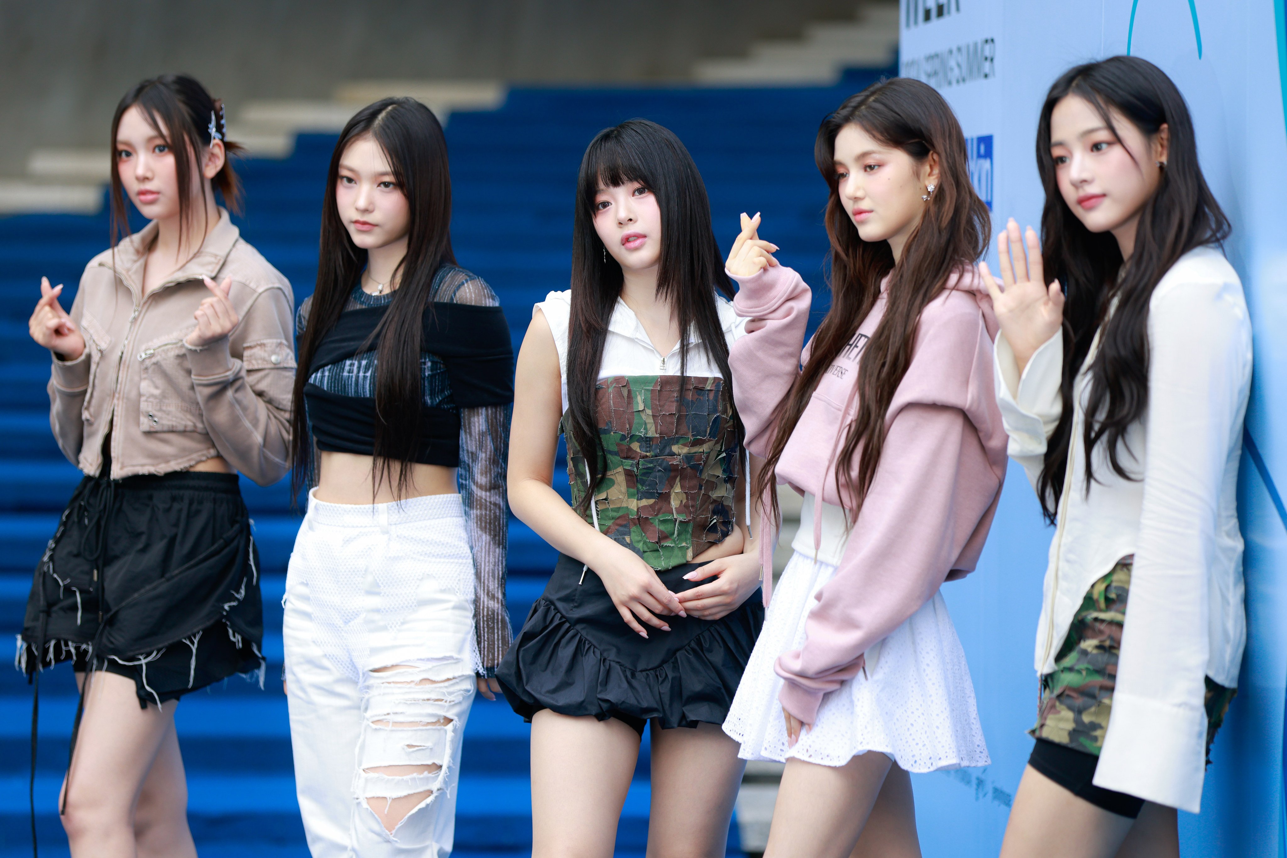 The five members of K-pop girl group NewJeans, now NJZ, attend the ULKIN show at Seoul Fashion Week spring/summer 2024 at the Dongdaemun Design Plaza (DDP) on September 5, 2023. Photo: Getty Images