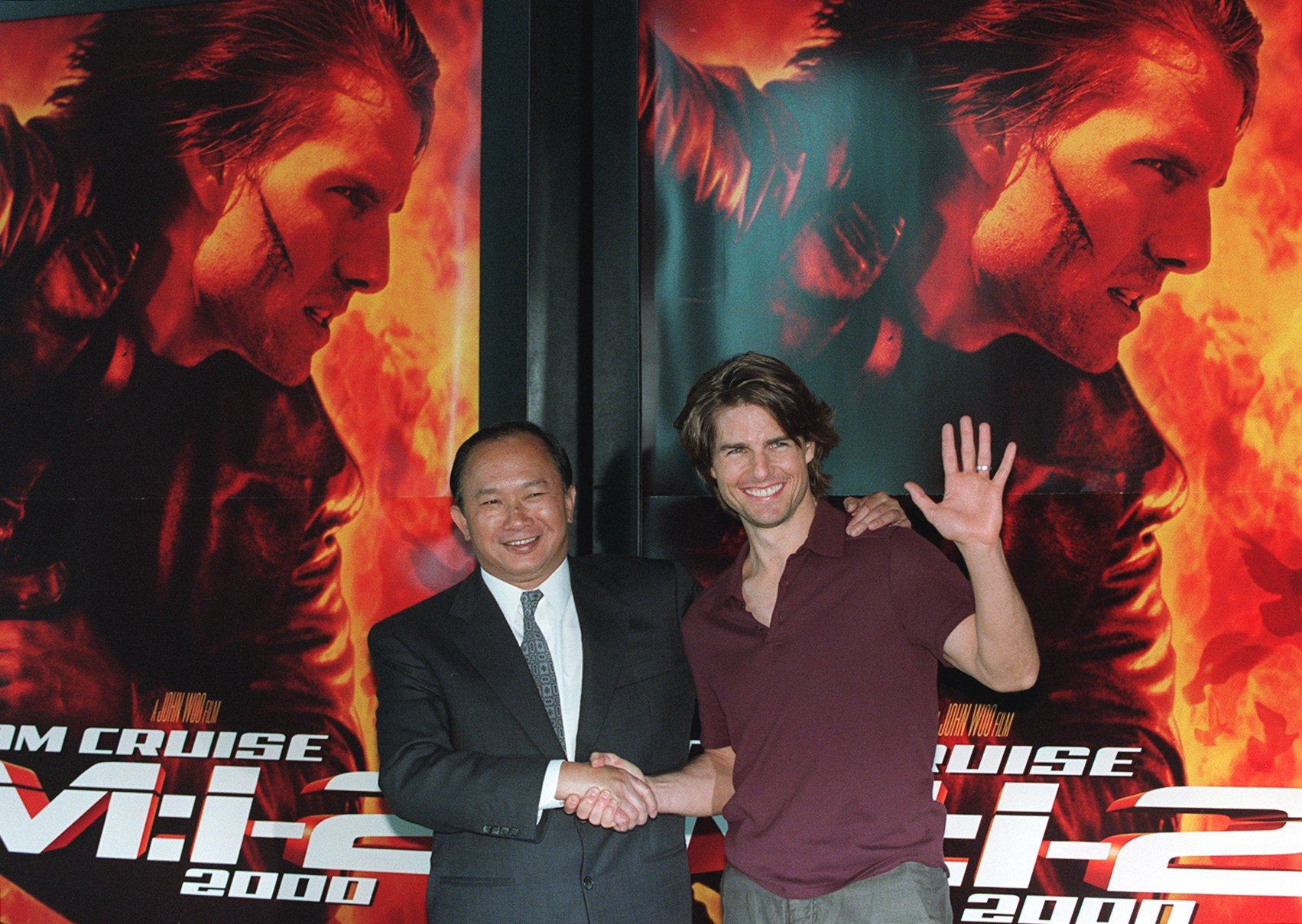 John Woo and Mission Impossible II star Tom Cruise in Hong Kong in 2000. Woo was just one Hong Kong director who thought Hollywood was the way forward at the turn of the century. Photo: SCMP