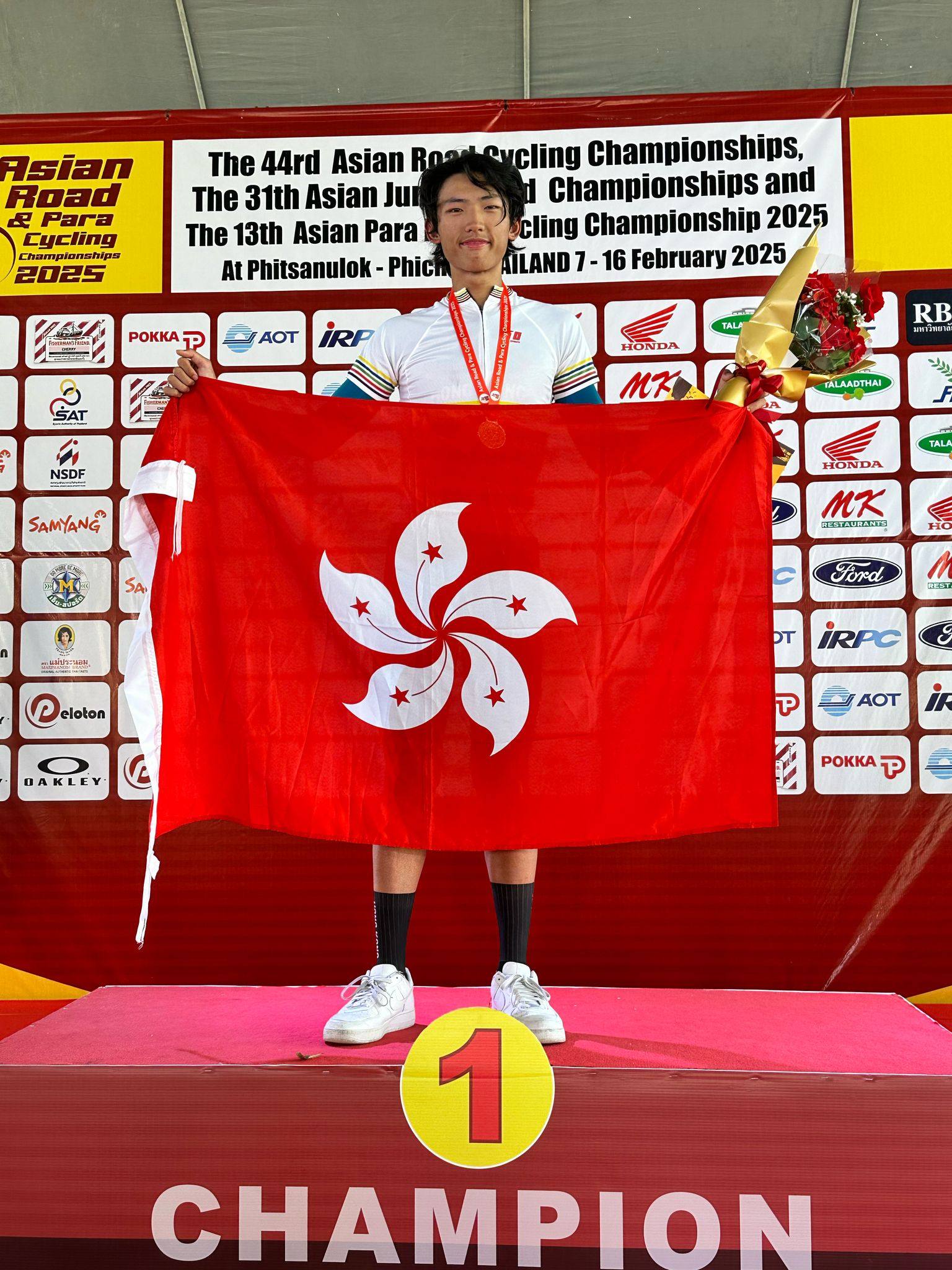 Daniel Yip celebrates his Asian Road Cycling Championships success. Photo: CAHK