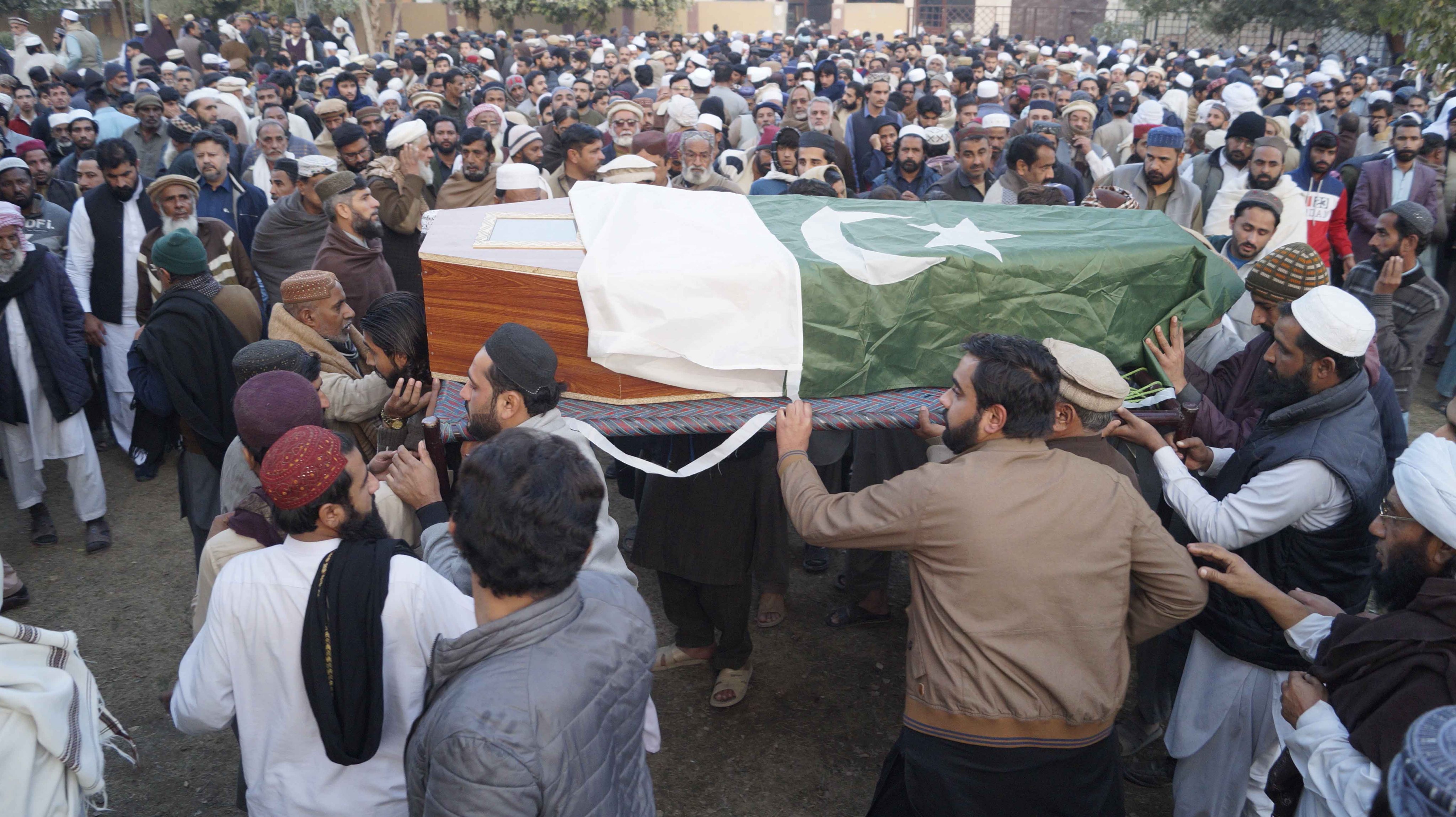 Relatives and local residents attend the funeral of a police officer who was killed by suspected militants in Dera Ismail Khan, Pakistan, on January 15 2025. Photo: EPA-EFE