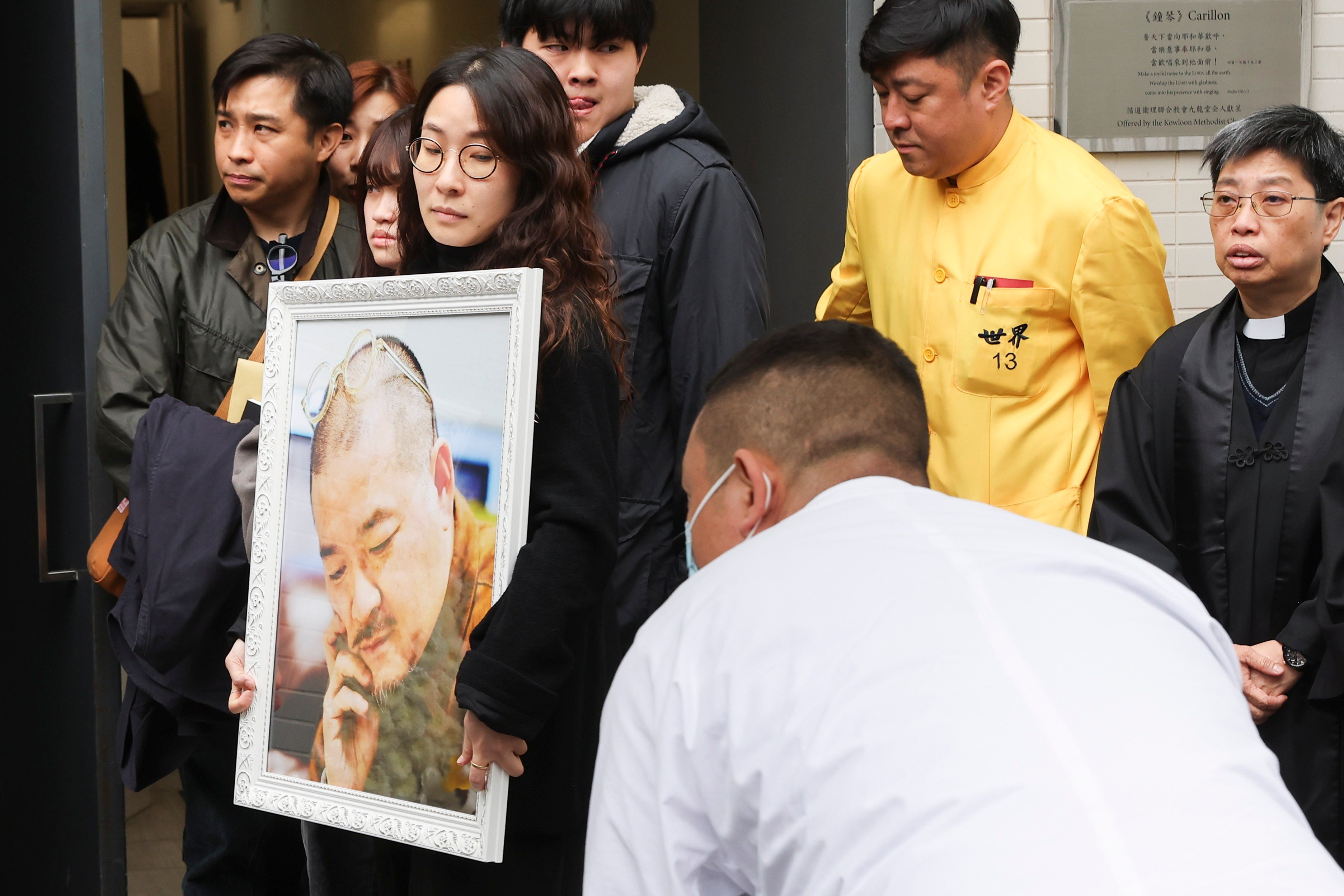 The service saw dozens of members of the public queue to pay their respects to the former lawmaker. Photo: Edmond So