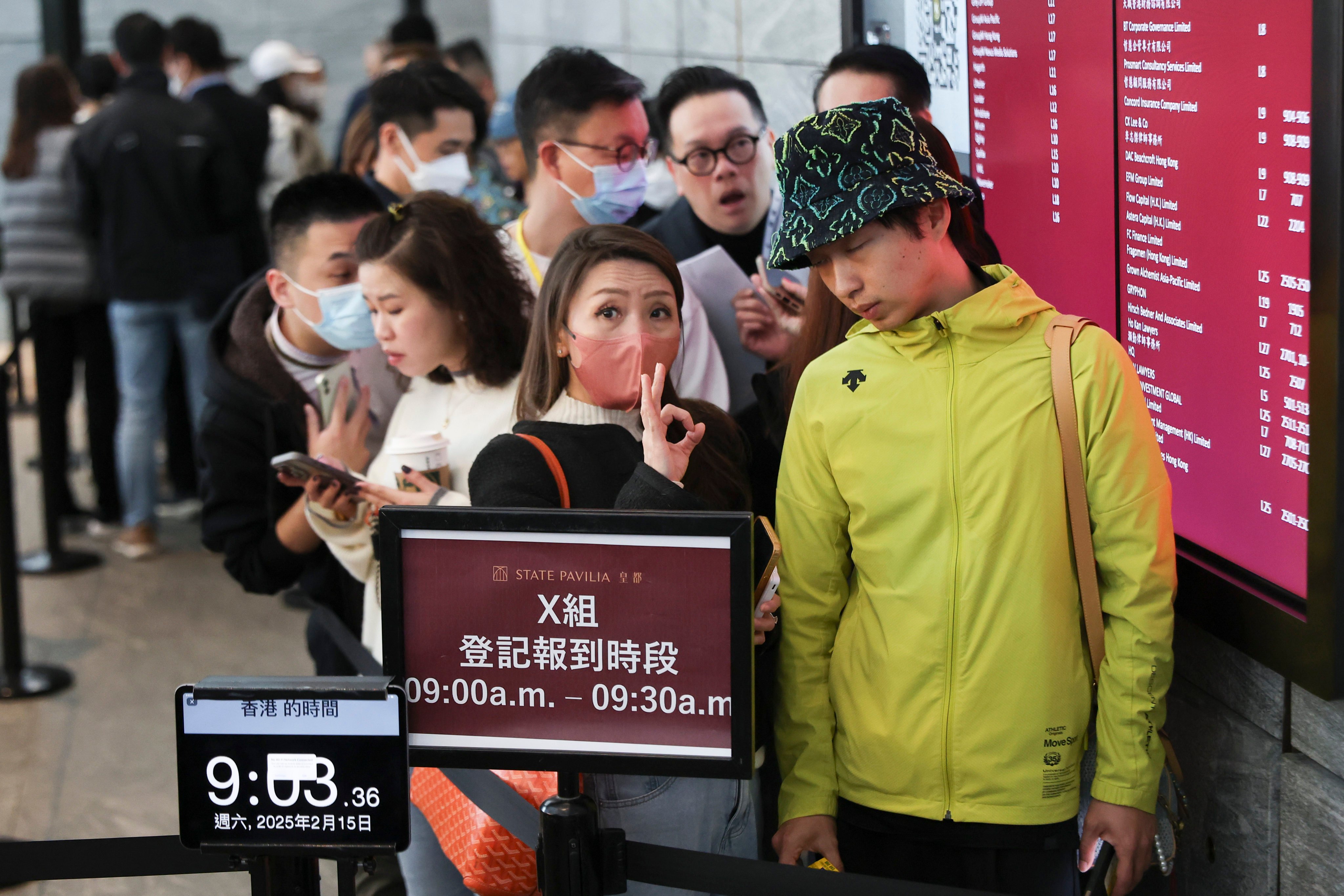 Potential buyers form a long queue at the Quarry Bay sales office for New World Development’s State Pavilia project in North Point. Photo: Edmond So