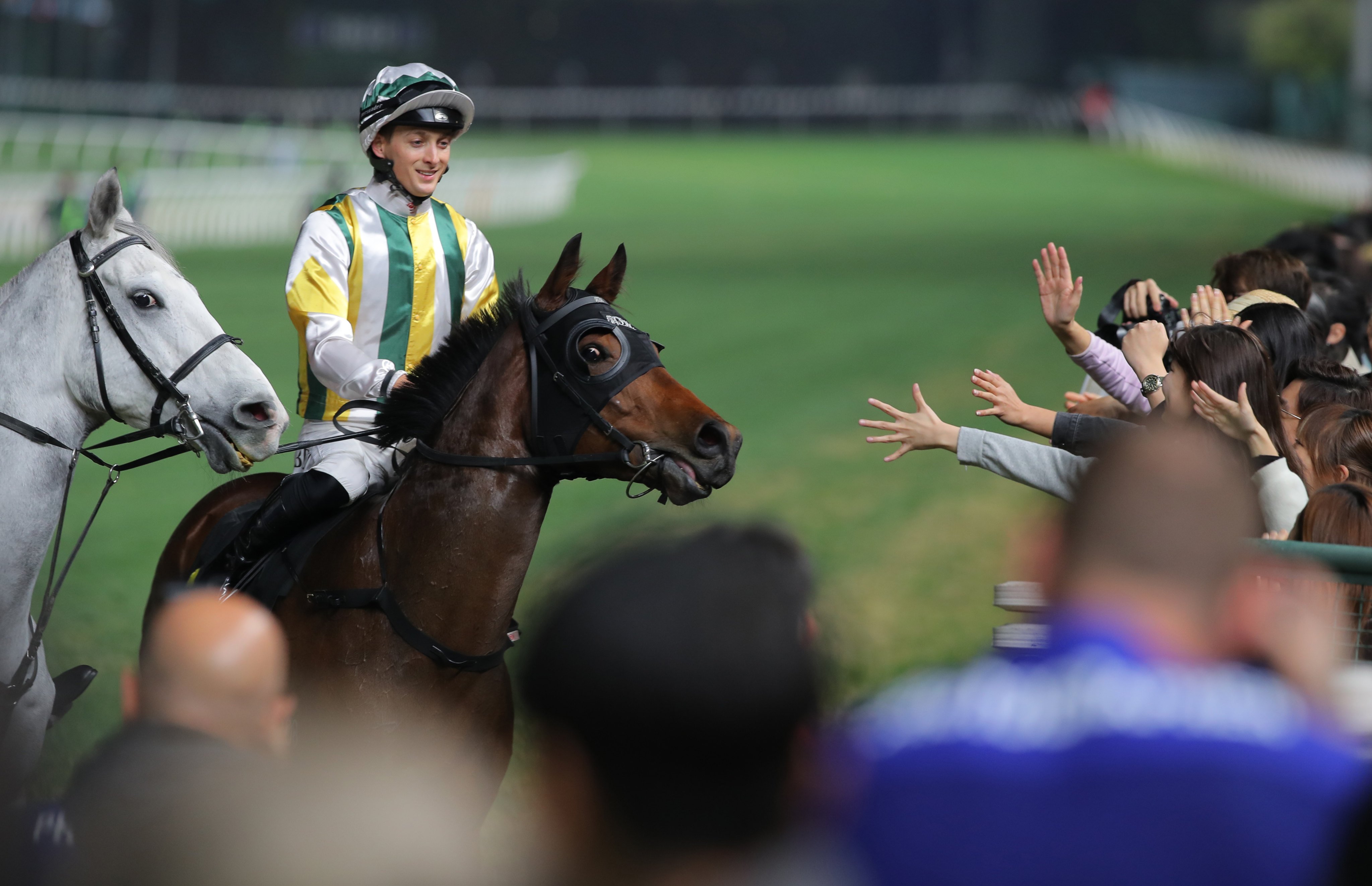 Harry Bentley returns to the applause of the Happy Valley crowd after a recent winner. Photo: Kenneth Chan