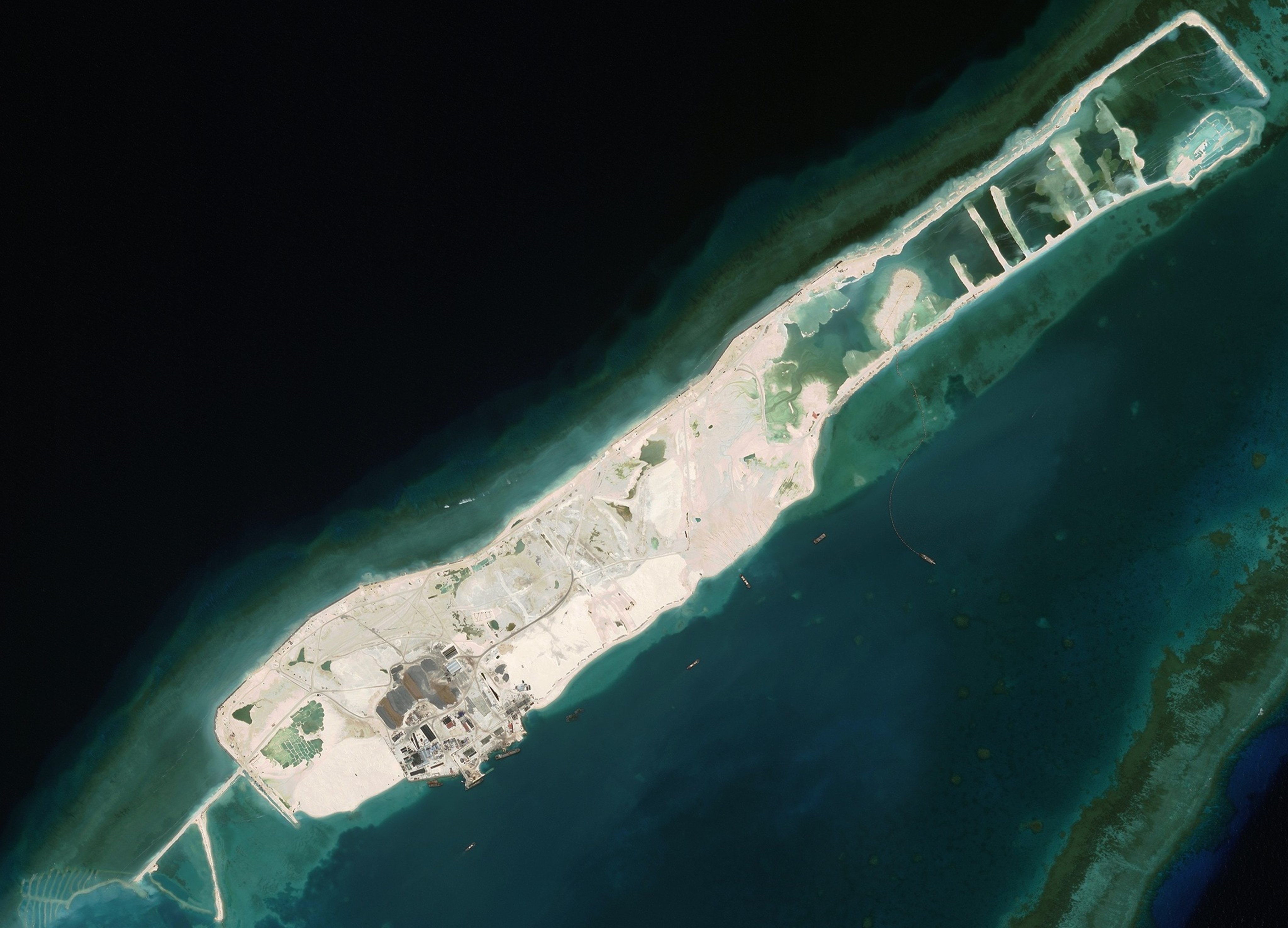 Barque Canada Reef, pictured in May 2024, is Vietnam’s largest outpost. Hanoi’s expanded presence is being studied by China’s natural resources ministry which is reporting on a new harbour on the reef. Photo: CSIS/AMTI