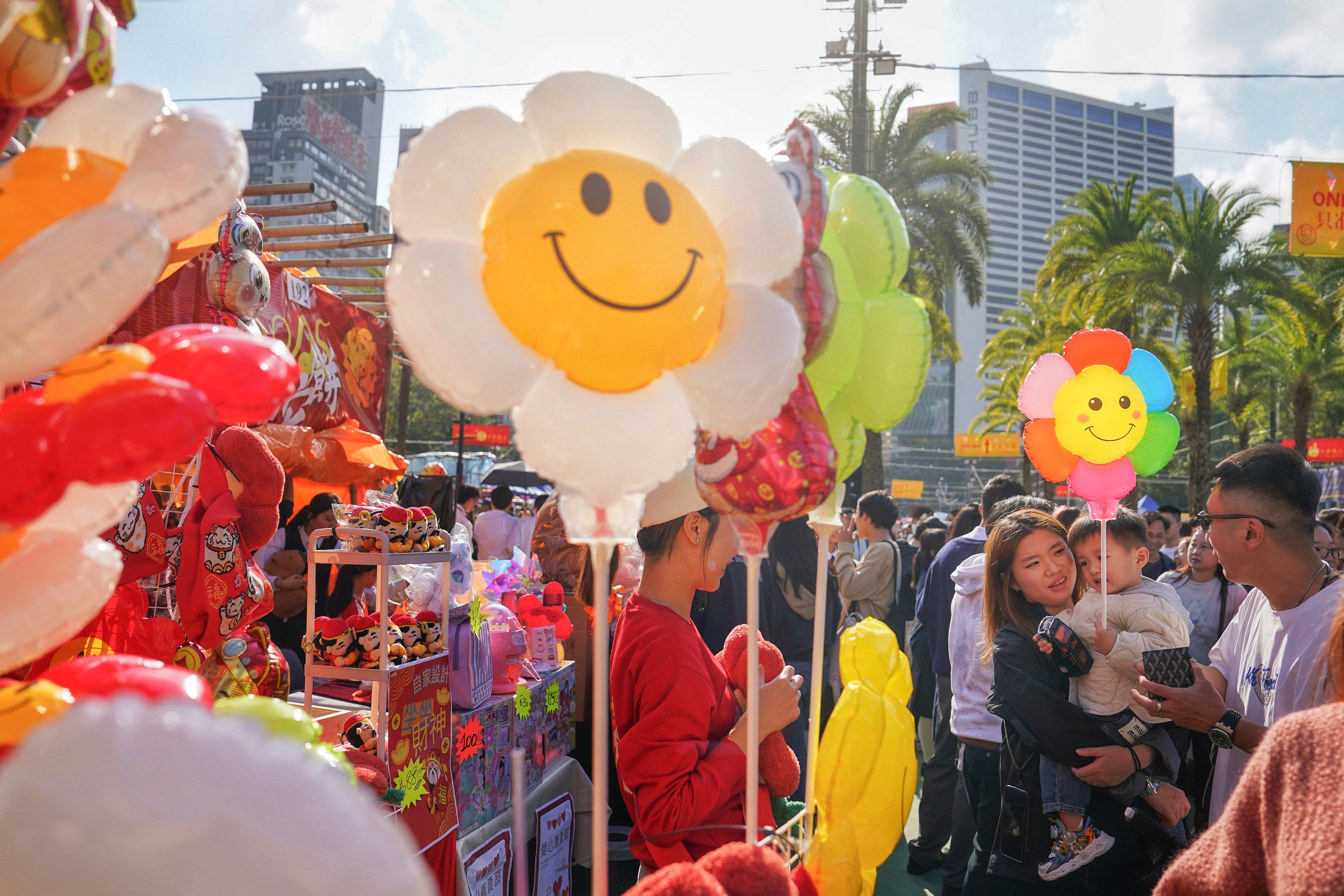 People browse through the stalls at the Lunar New Year fair at Victoria Park on January 25.  Photo: Elson Li