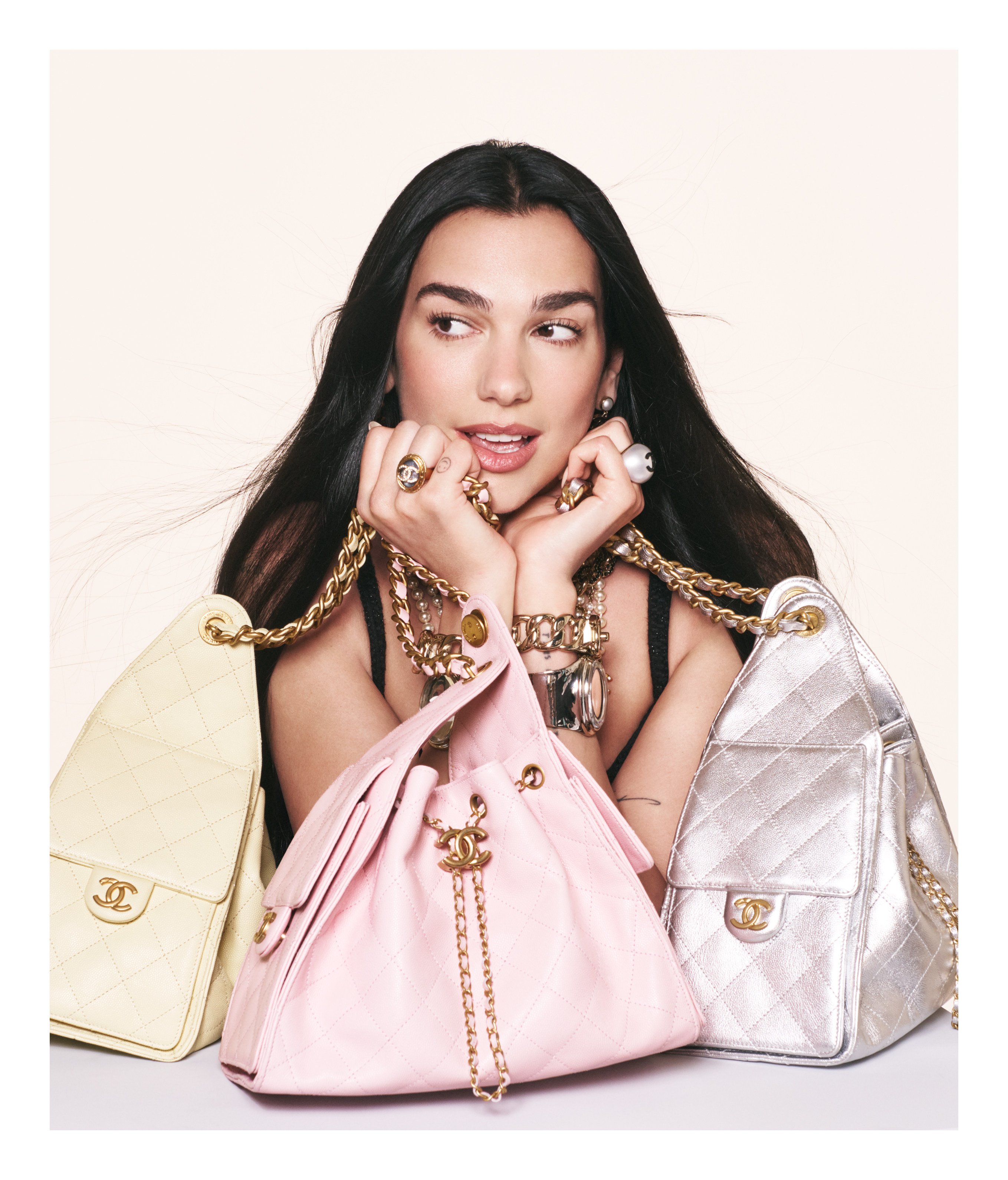 Dua Lipa is the face of the new Chanel 25 bag, while the maison also designed custom looks for her recent Asian tour. Photo: Handout