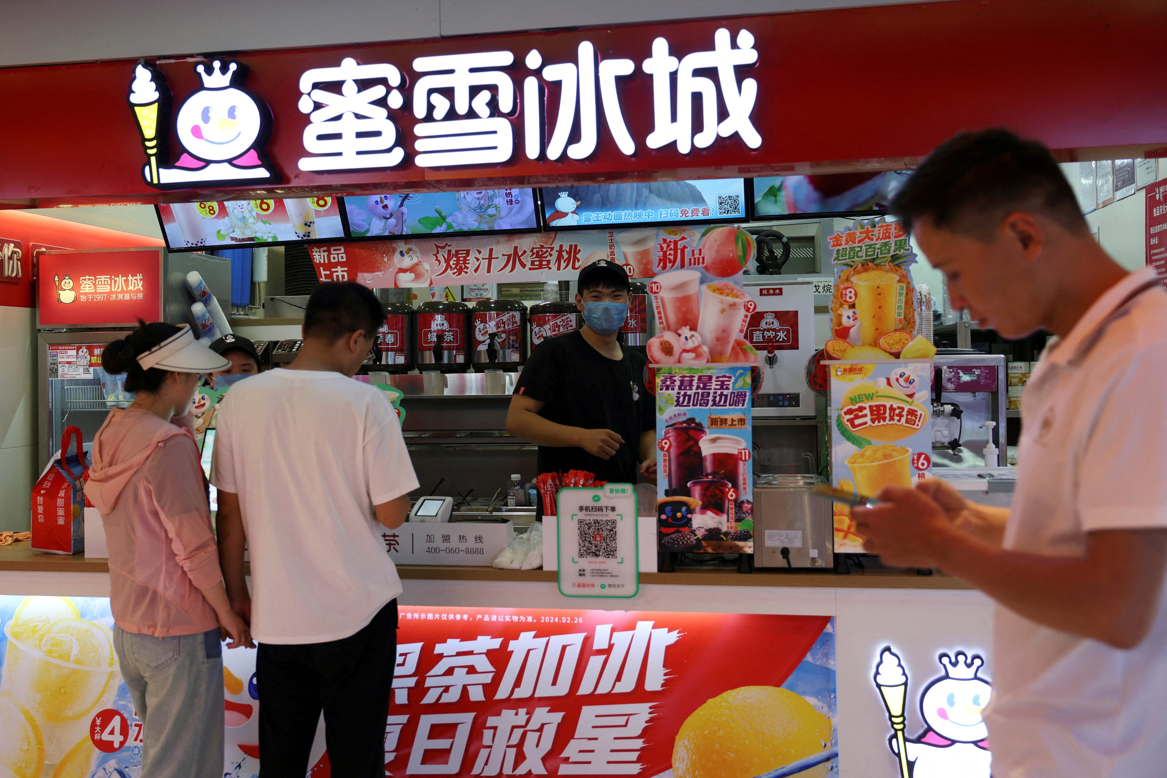 Customers wait at a Mixue store at a shopping mall in Beijing on September 19, 2024. Photo: Reuters