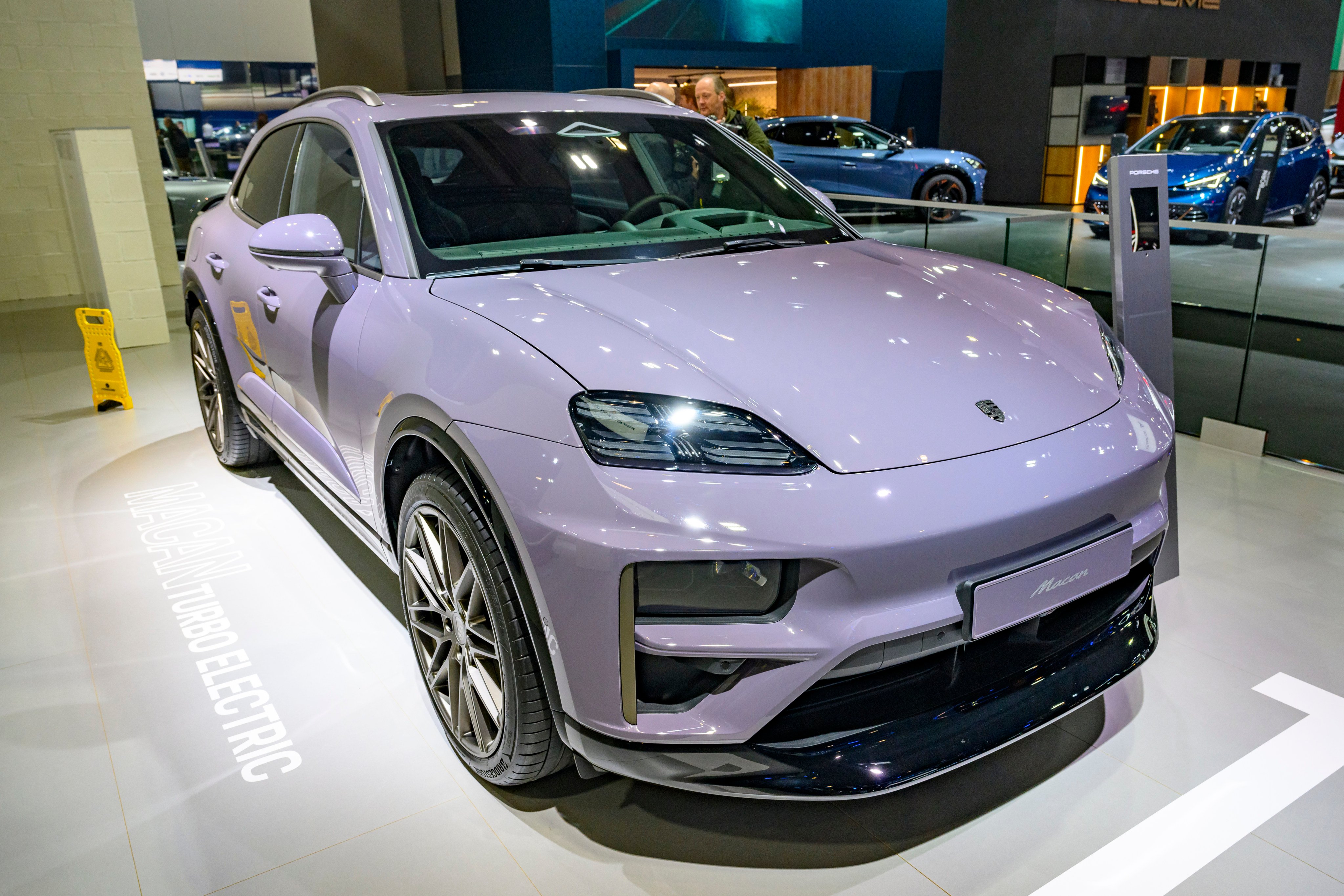 BRUSSELS, BELGIUM - JANUARY 10: Porsche Macan Turbo Electric compact luxury crossover battery electric SUV car on display at the AutoSalon on January 10, 2025 in Brussels, Belgium. (Photo by Sjoerd van der Wal/Getty Images)