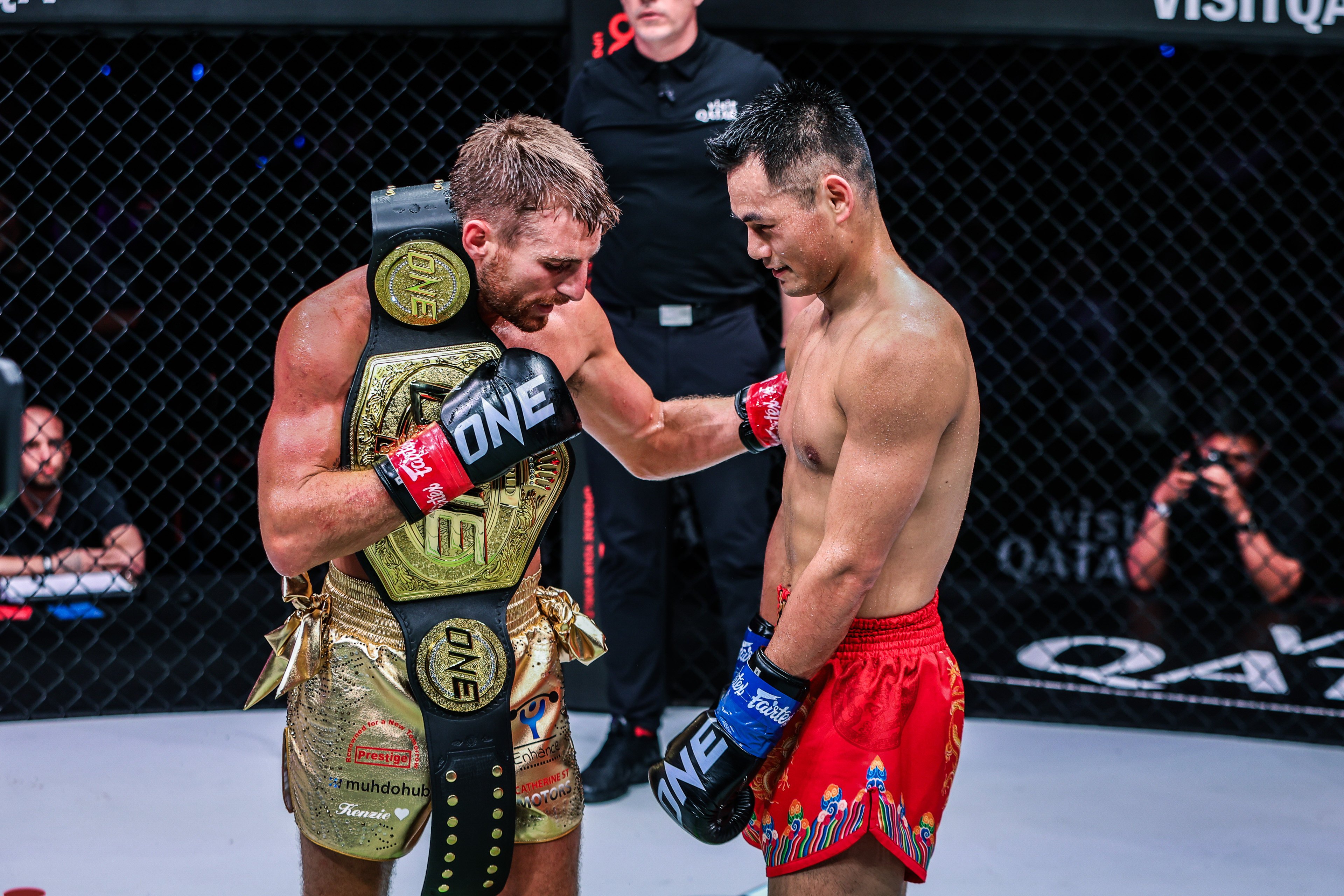 Wu Rei (right) congratulates bantamweight kickboxing champion Jonathan Haggerty after their hard-fought battle at ONE 171. Photo: ONE Championship