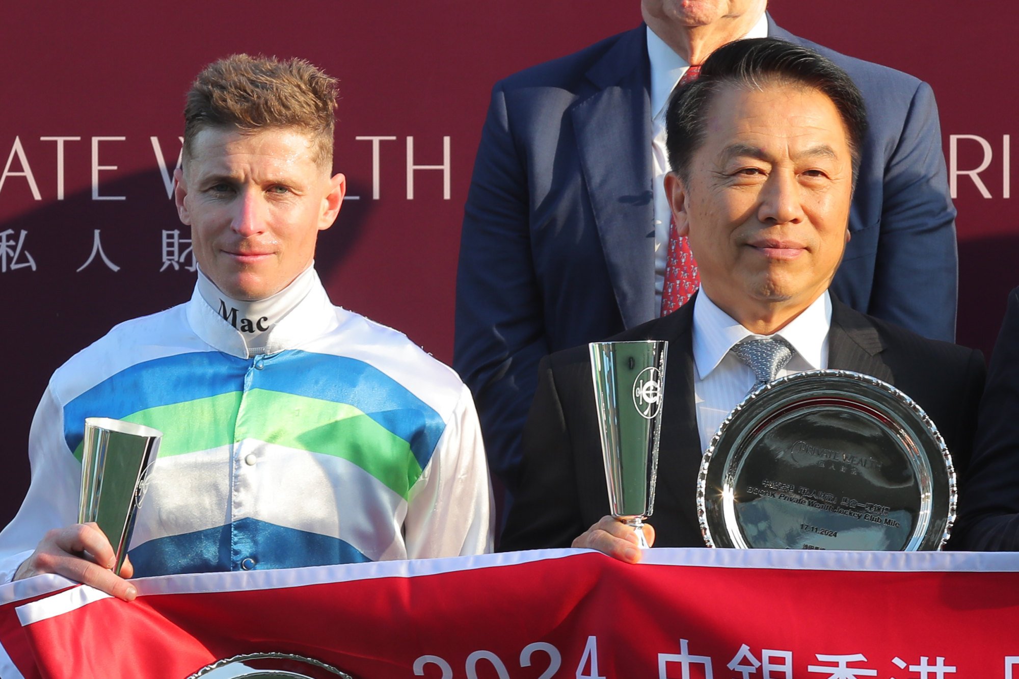 Jockey James McDonald and trainer Ricky Yiu enjoy a Voyage Bubble victory.