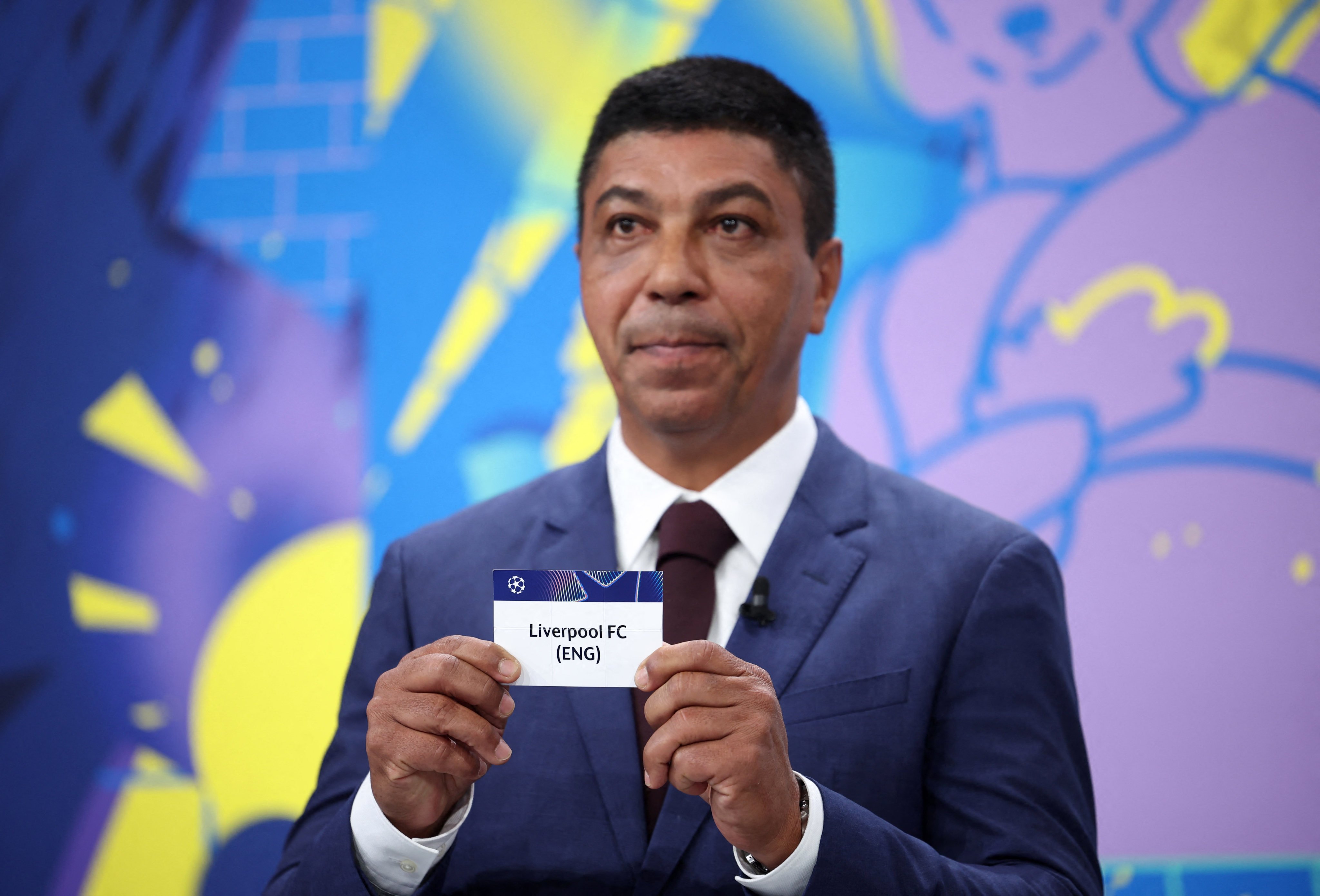 Former Brazil footballer Giovane Elber draws Liverpool out of the pot. Photo: Reuters