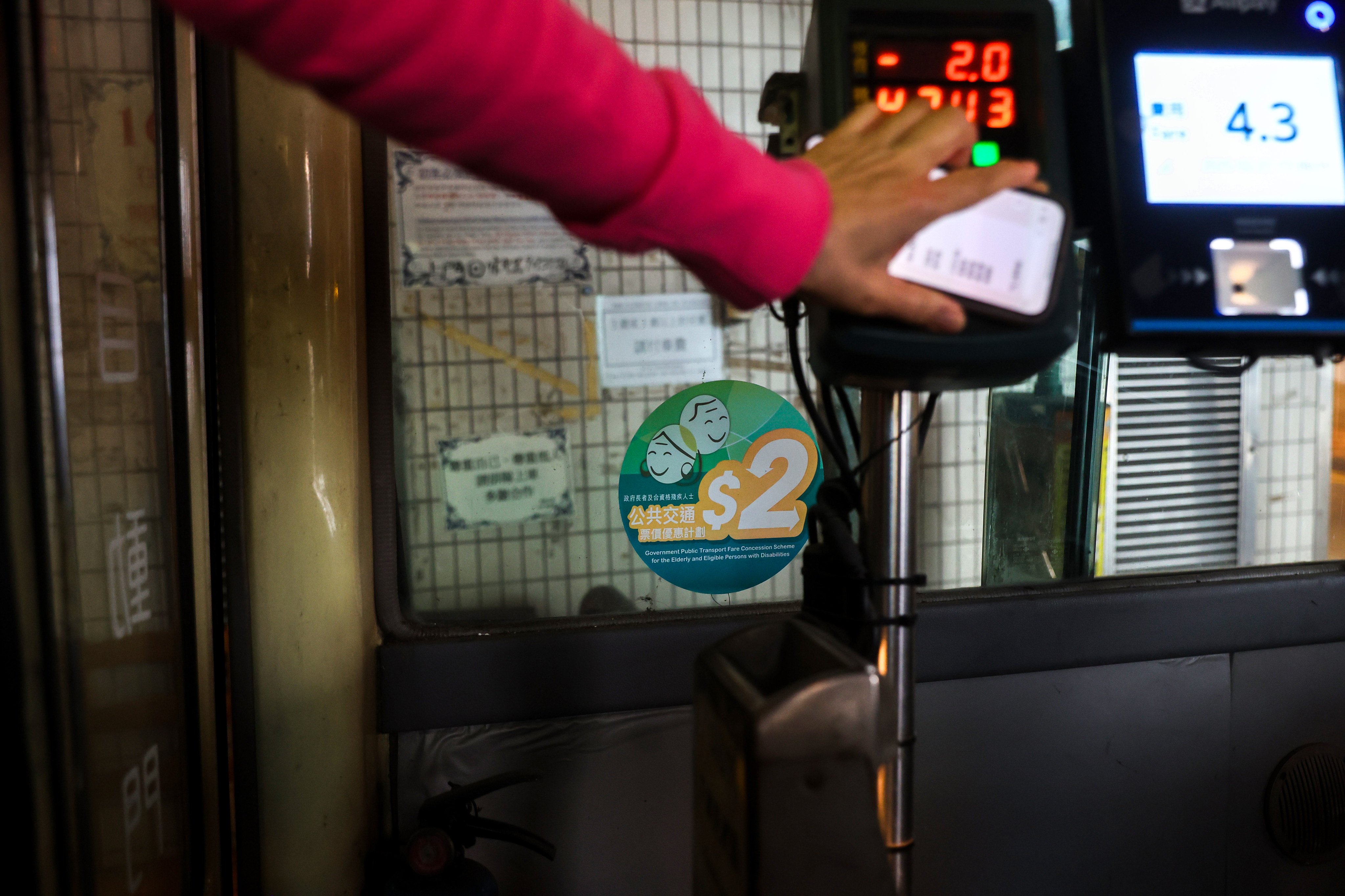 Introduced in 2012, the scheme allows people aged 60 or above, and those with disabilities, to pay only HK$2 per trip on public transport. Photo: Edmond So