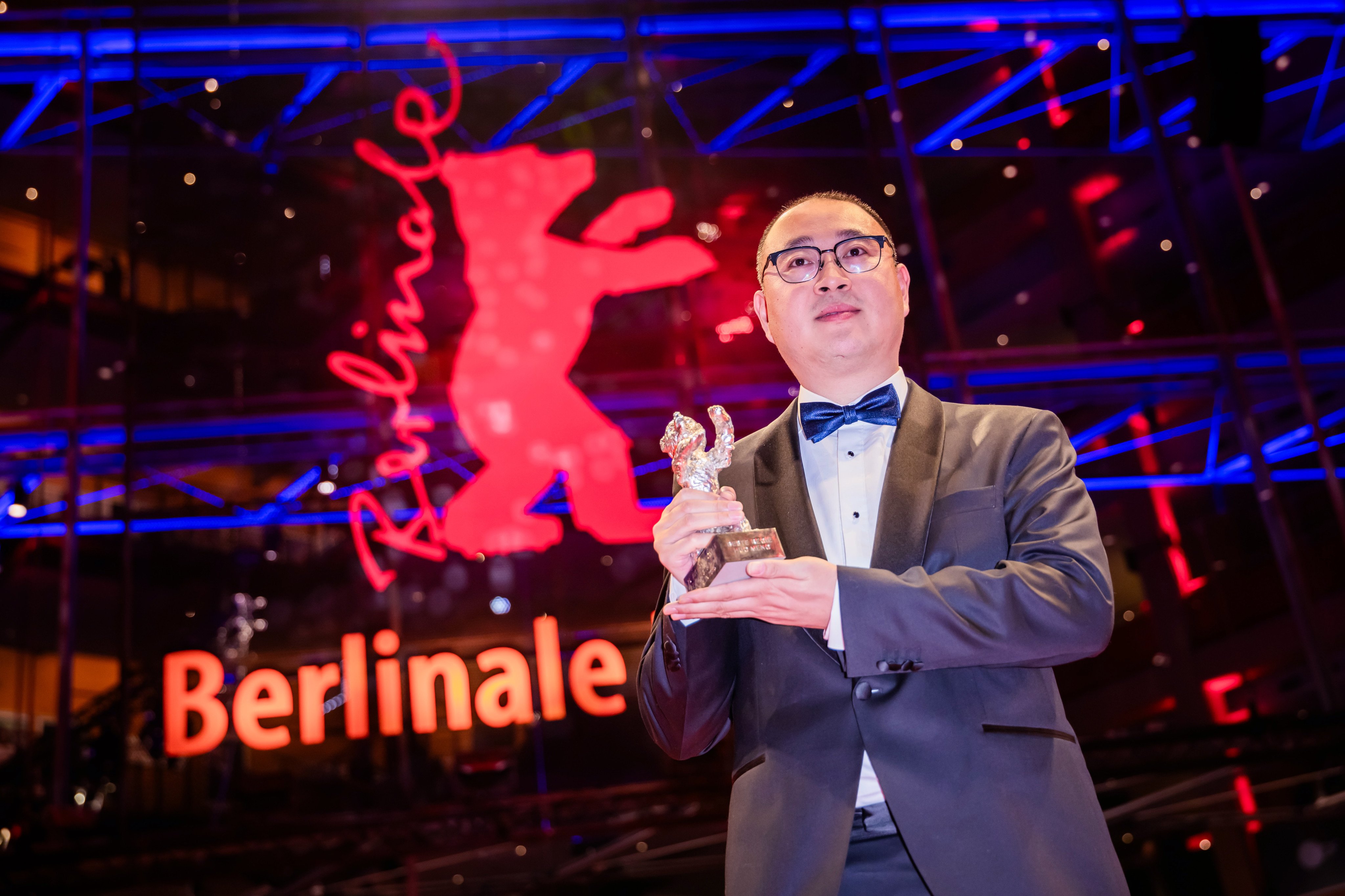 Chinese director Huo Meng with his Silver Bear for best director at the Berlin International Film Festival. Photo: dpa