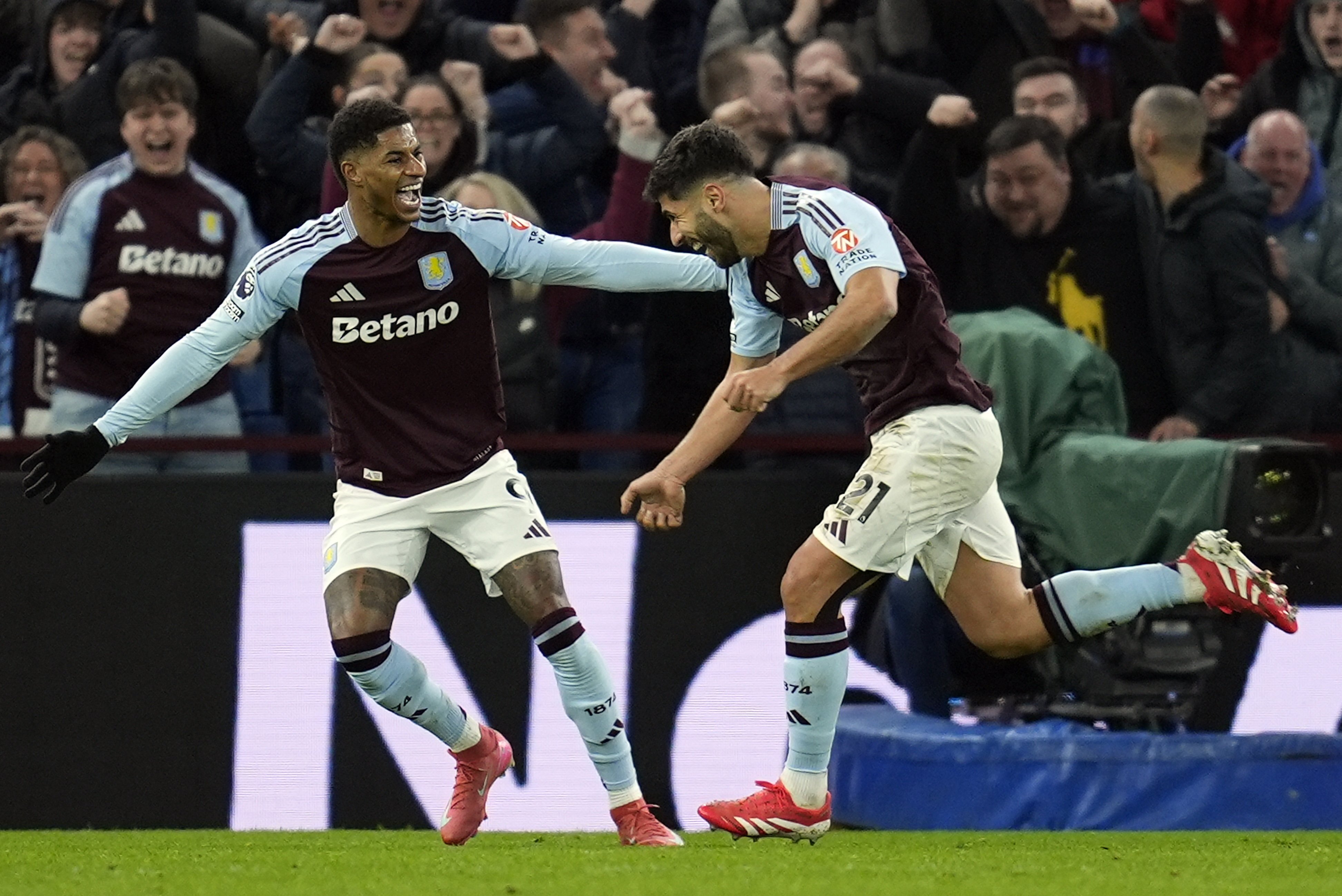 Aston Villa’s Marco Asensio (right) celebrates with teammate Marcus Rashford after scoring the winner against Chelsea. Photo: EPA-EFE