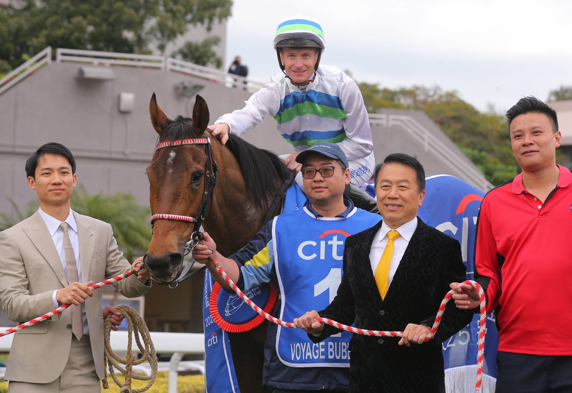 Jockey James McDonald and trainer Ricky Yiu (second from right) after Voyage Bubble’s Gold Cup win.